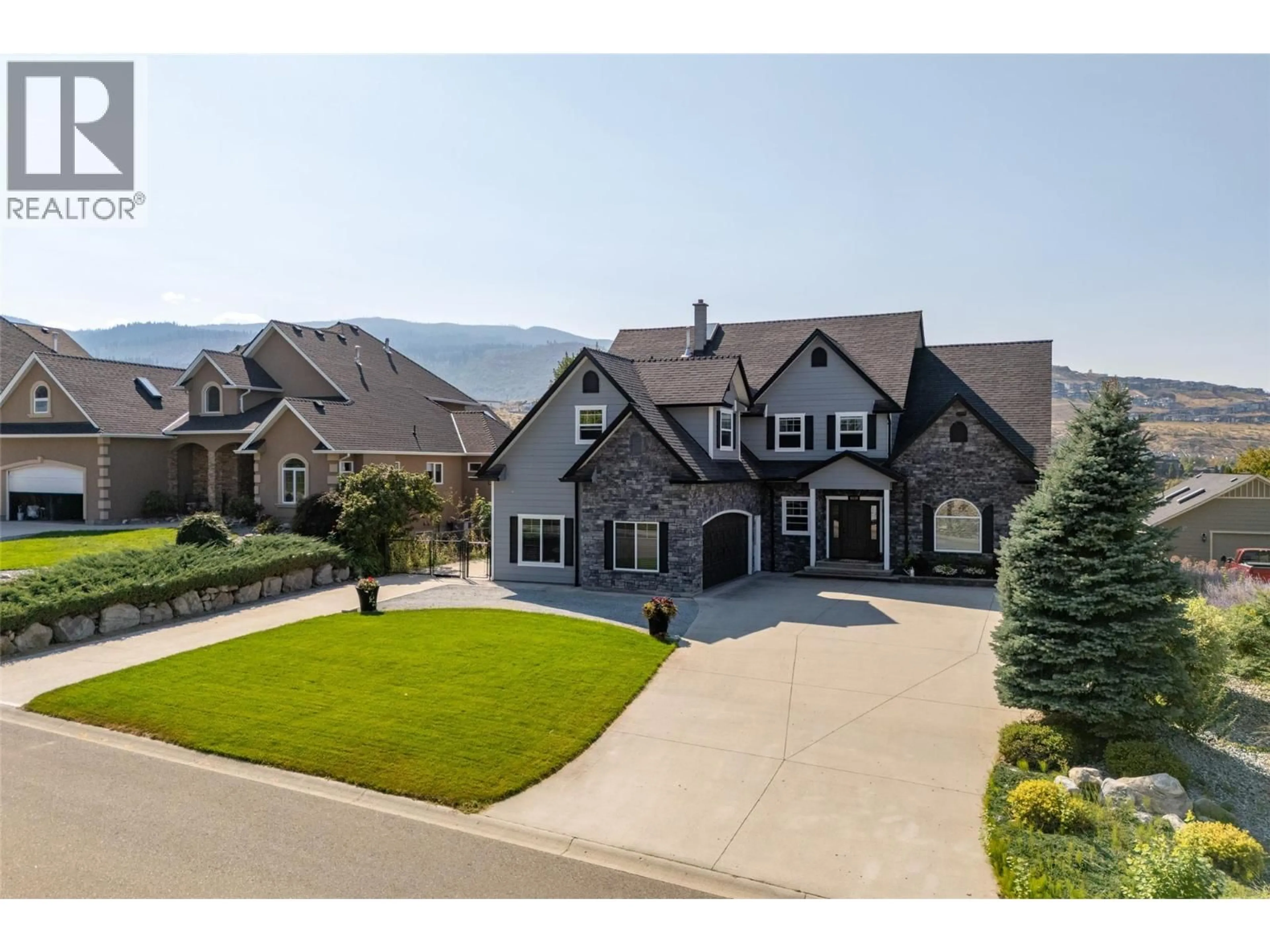 A pic from outside/outdoor area/front of a property/back of a property/a pic from drone, mountain view for 4830 WESTRIDGE DRIVE, Kelowna British Columbia V1W3B4