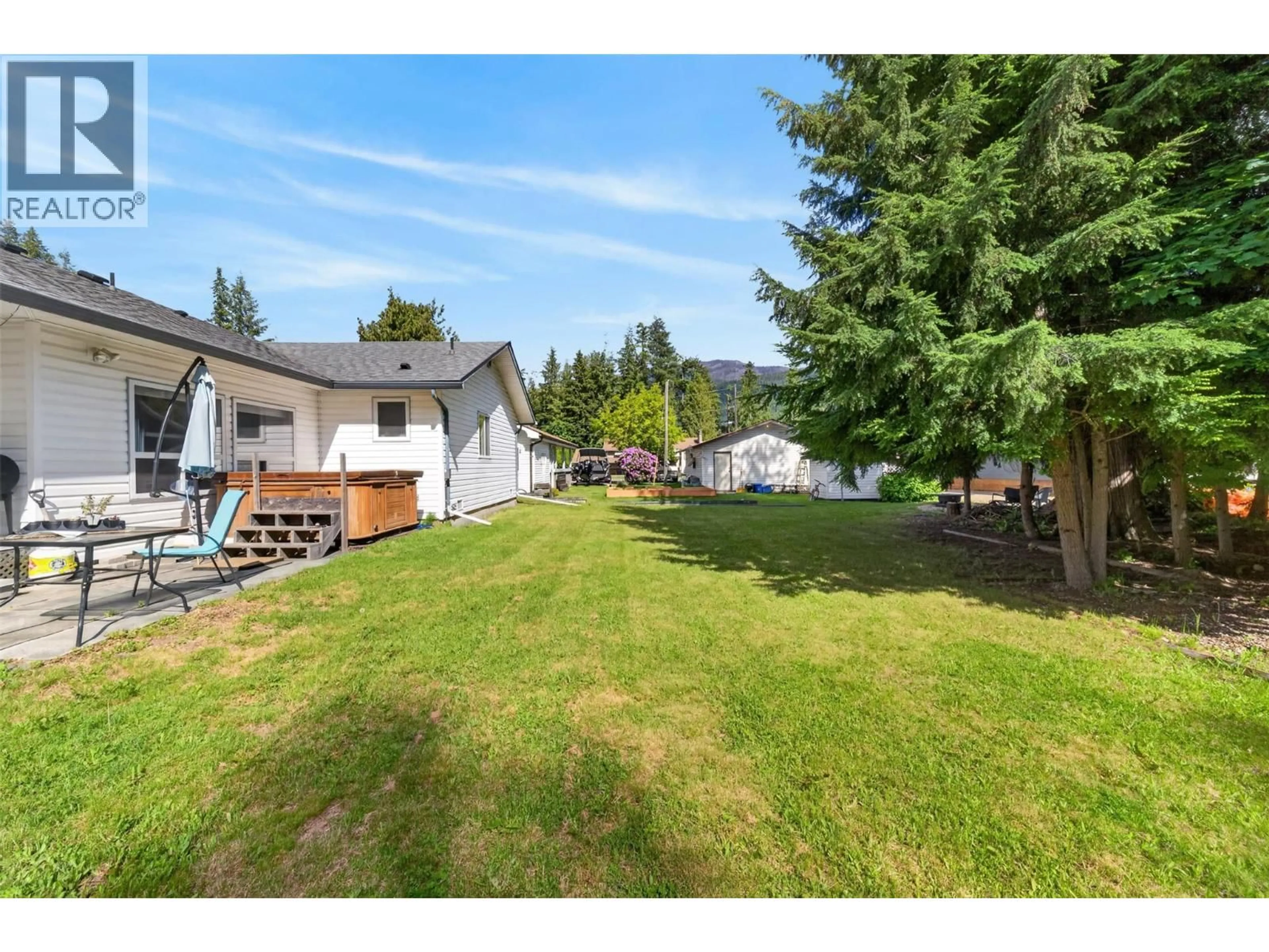 A pic from outside/outdoor area/front of a property/back of a property/a pic from drone, mountain view for 313 HEMLOCK CRESCENT NORTH, Sicamous British Columbia V0E2V1