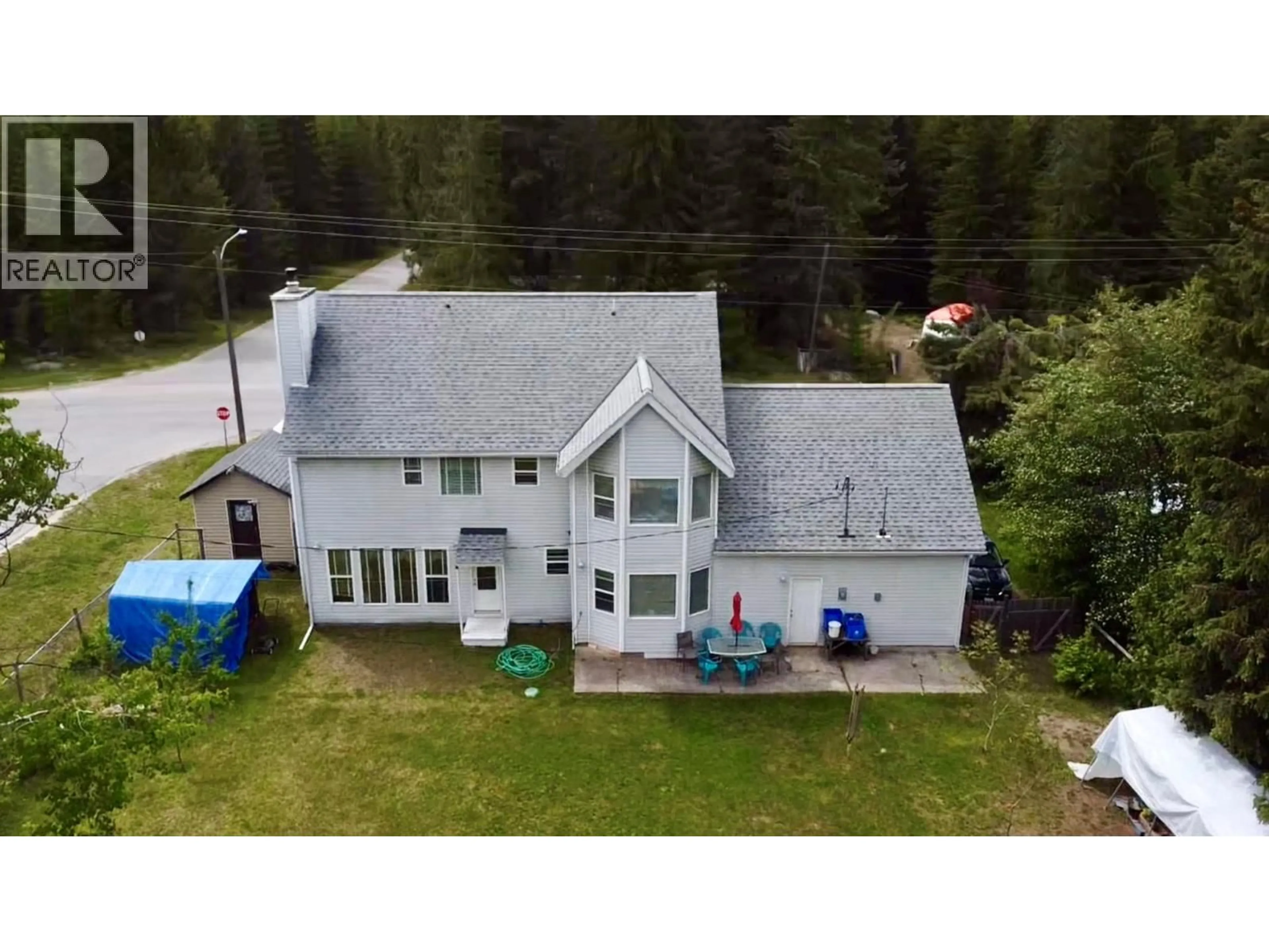 A pic from outside/outdoor area/front of a property/back of a property/a pic from drone, water/lake/river/ocean view for 1118 HAROLD STREET, Slocan British Columbia V0G2C0