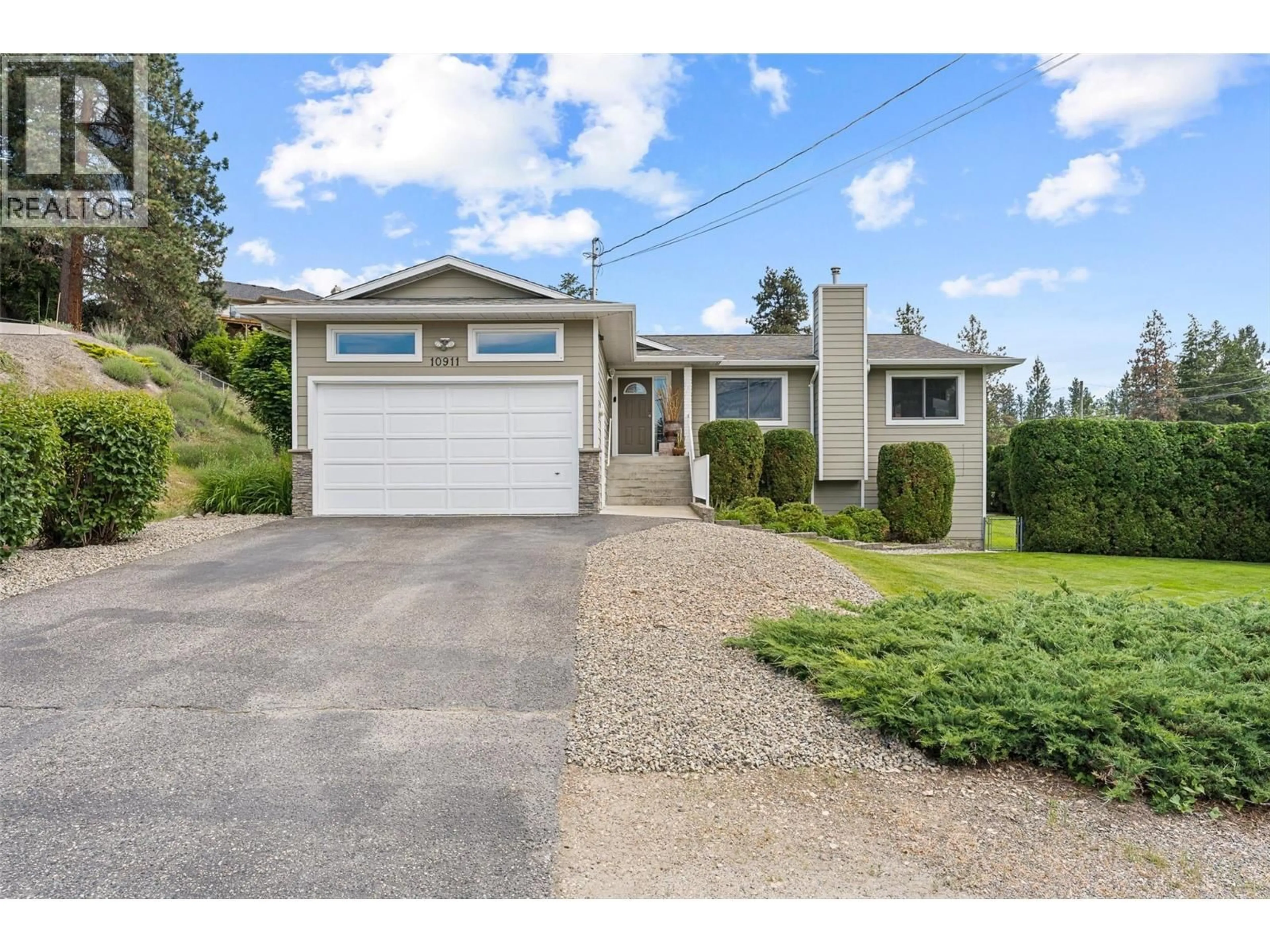 Home with vinyl exterior material, street for 10911 LEHMANN ROAD, Lake Country British Columbia V4V1N9