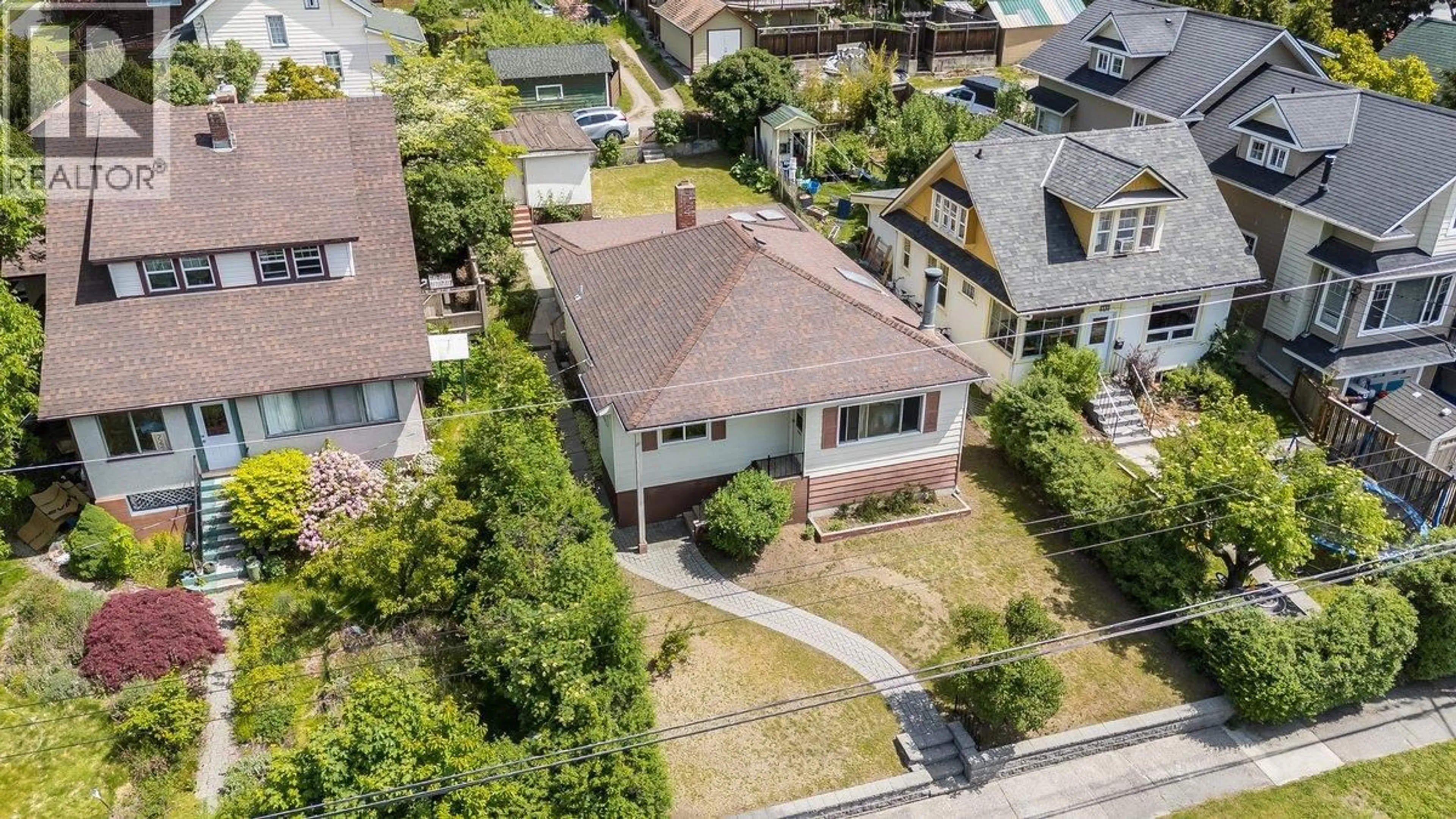 A pic from outside/outdoor area/front of a property/back of a property/a pic from drone, street for 720 THIRD STREET, Nelson British Columbia V1L2R2