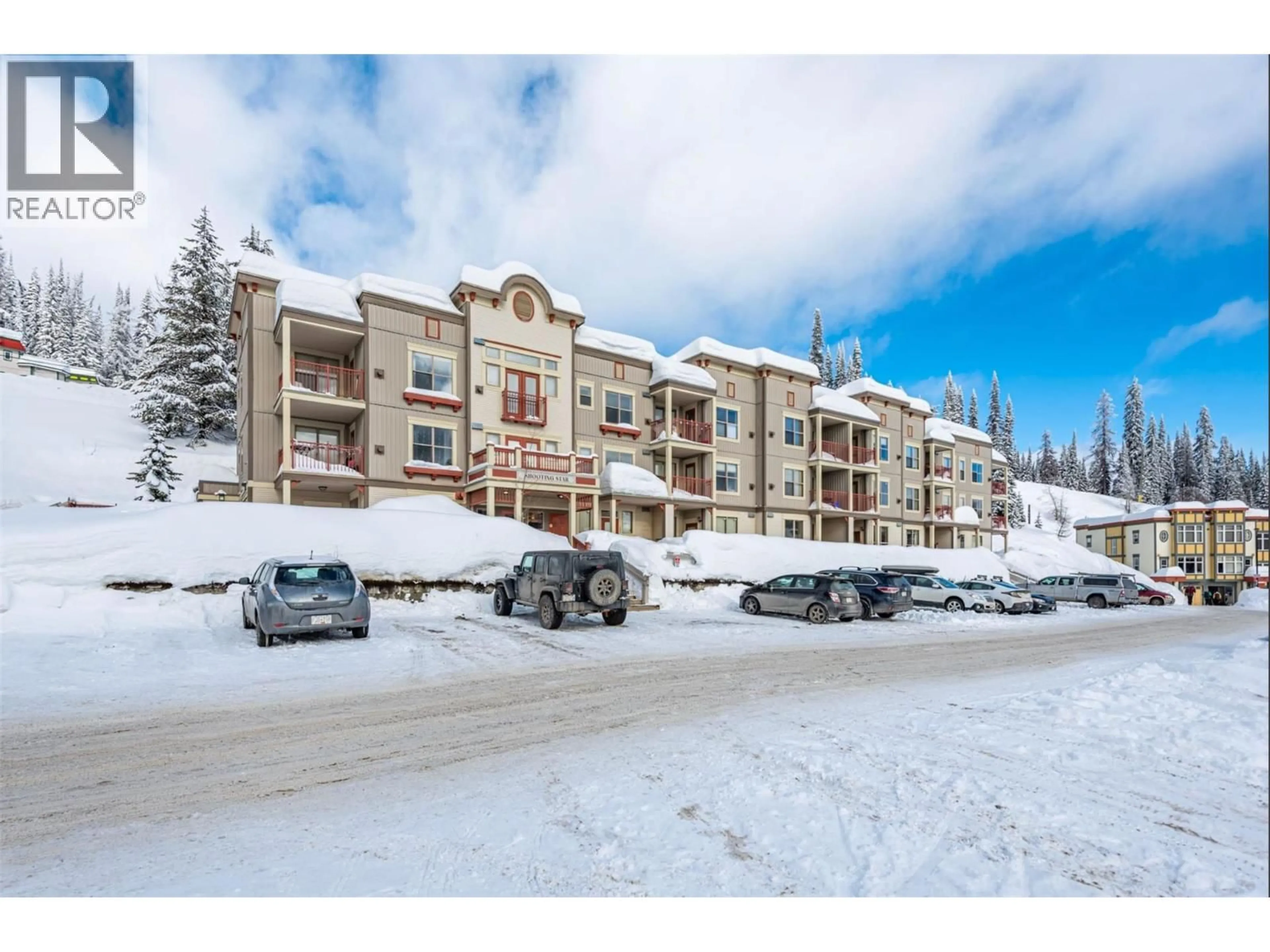 A pic from outside/outdoor area/front of a property/back of a property/a pic from drone, mountain view for 205 - 9802 SILVER STAR ROAD, Vernon British Columbia V1B3W9