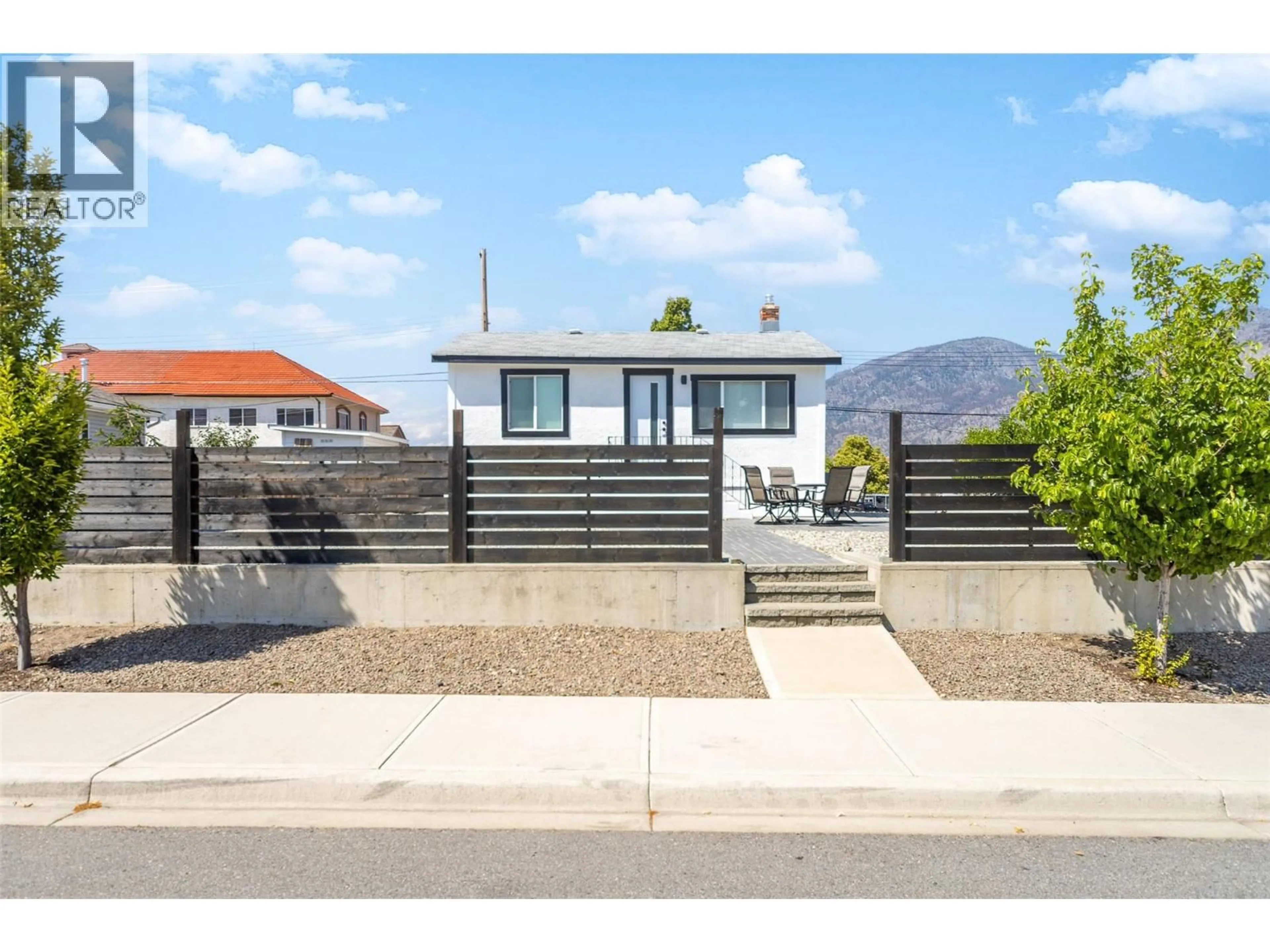 Home with vinyl exterior material, street for 8706 74TH AVENUE, Osoyoos British Columbia V1H1V0