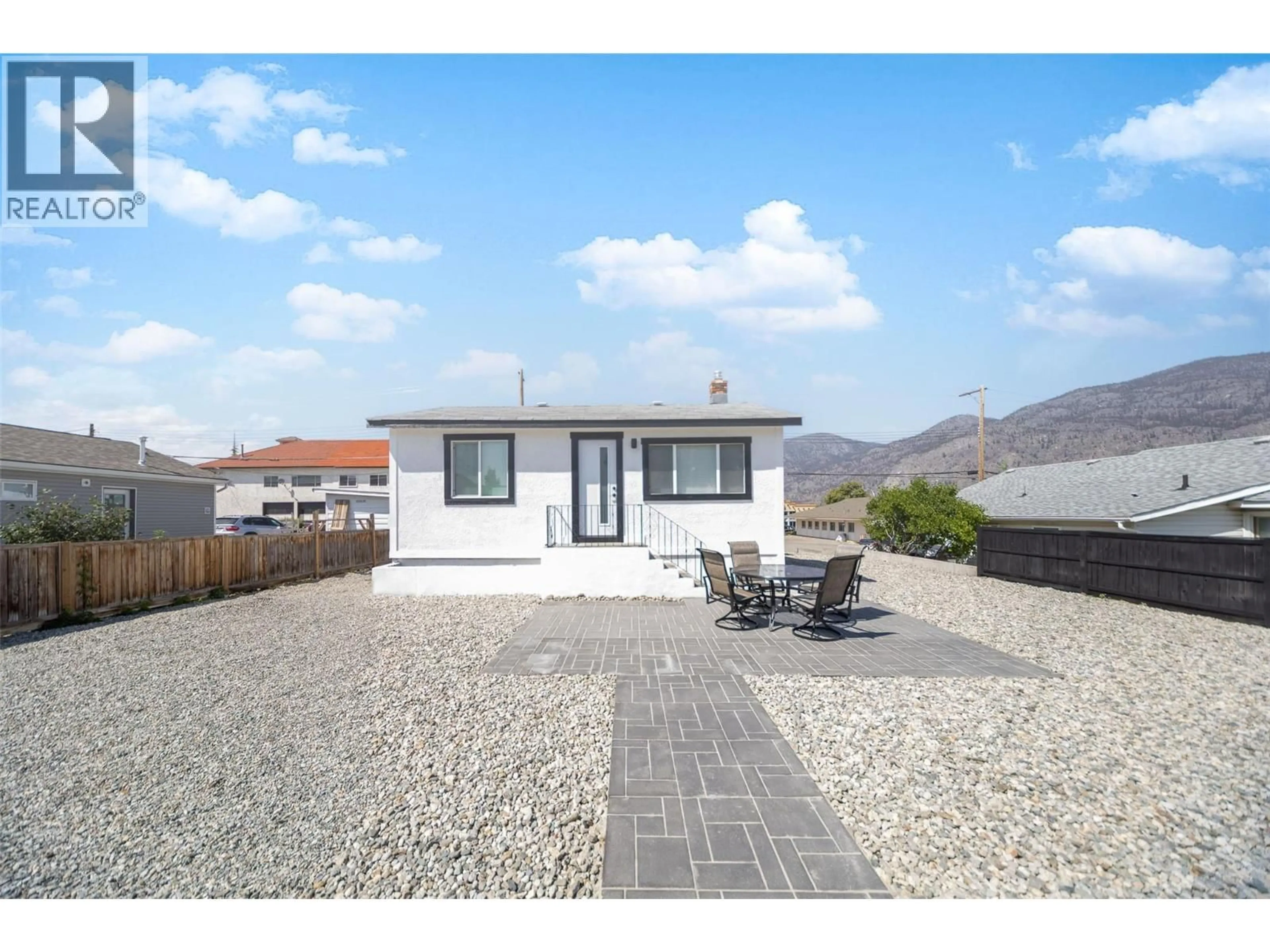 A pic from outside/outdoor area/front of a property/back of a property/a pic from drone, street for 8706 74TH AVENUE, Osoyoos British Columbia V1H1V0