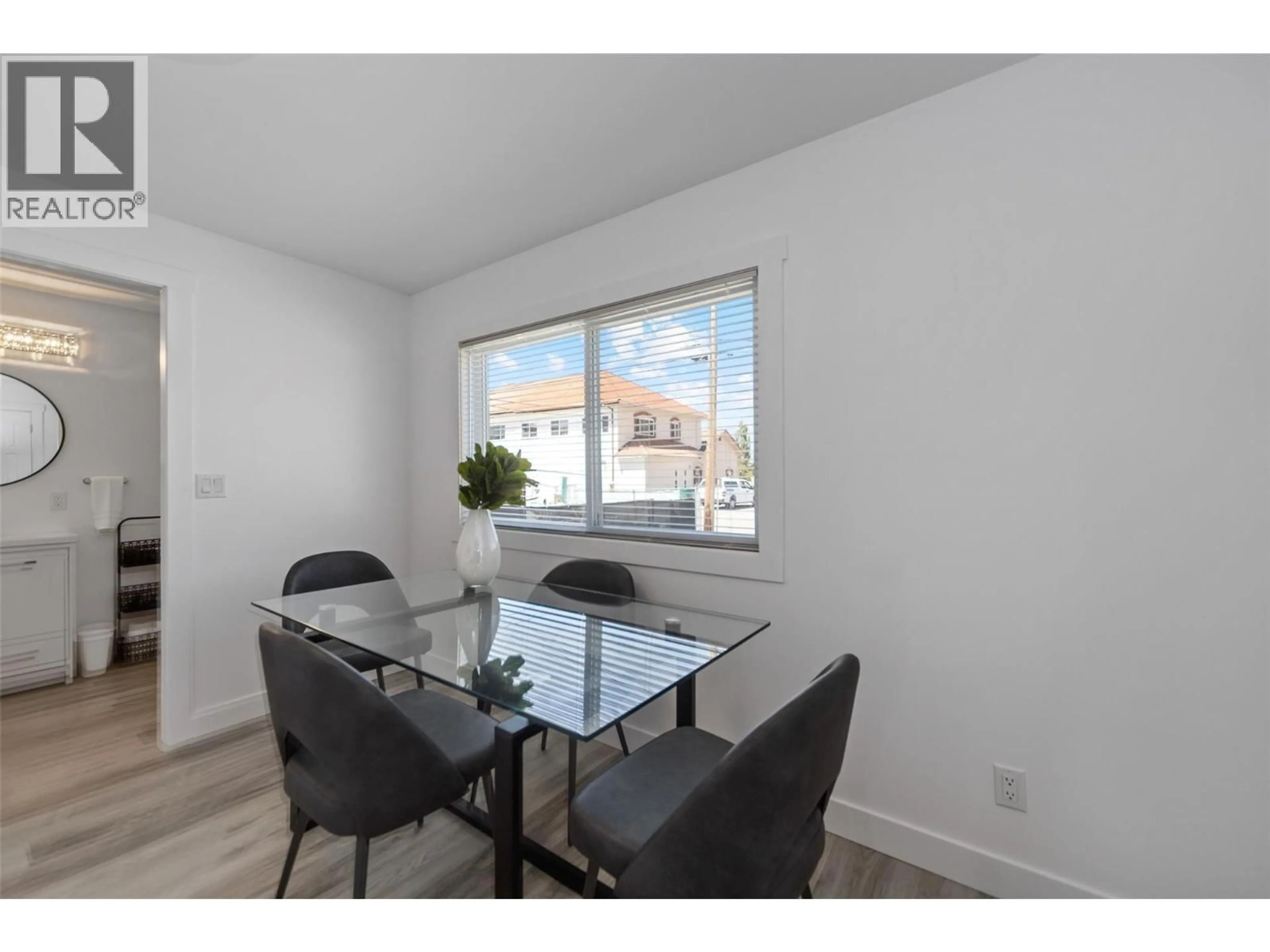 Dining room, wood/laminate floor for 8706 74TH AVENUE, Osoyoos British Columbia V1H1V0
