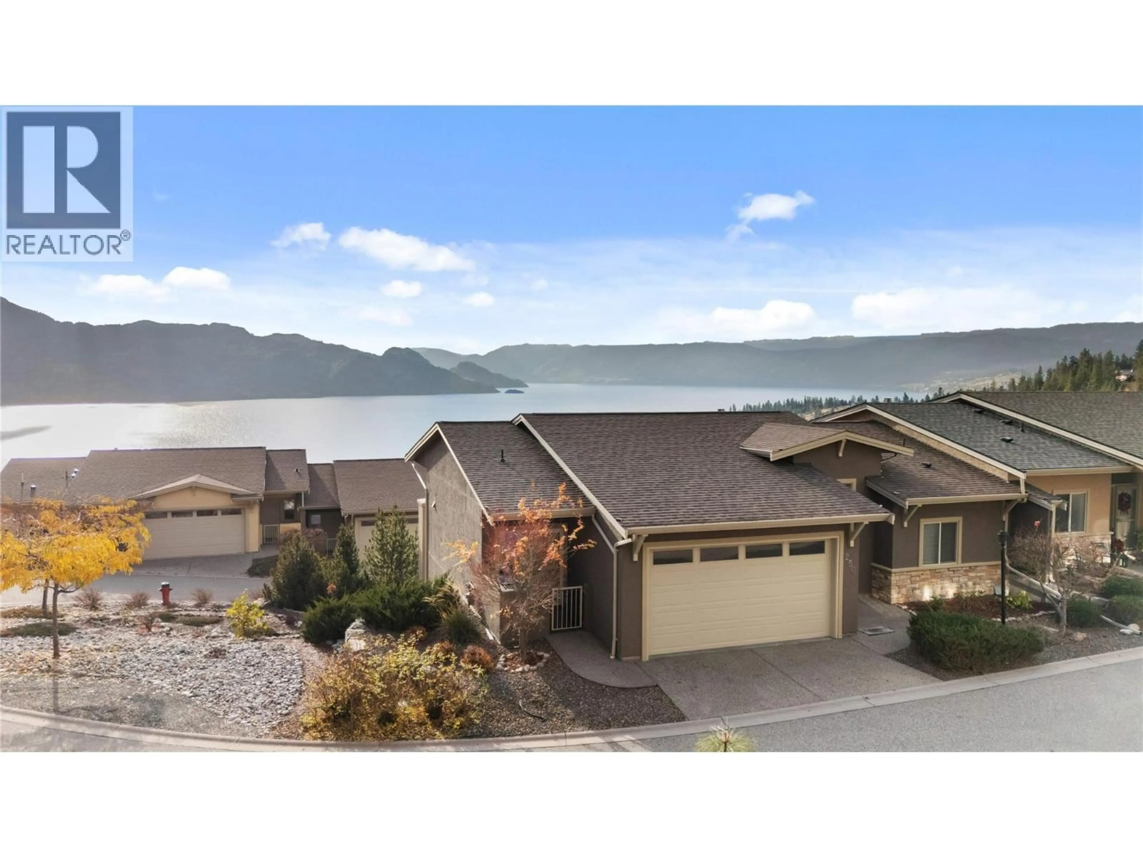 A pic from outside/outdoor area/front of a property/back of a property/a pic from drone, water/lake/river/ocean view for 250 - 5165 TREPANIER BENCH ROAD, Peachland British Columbia V0H1X2