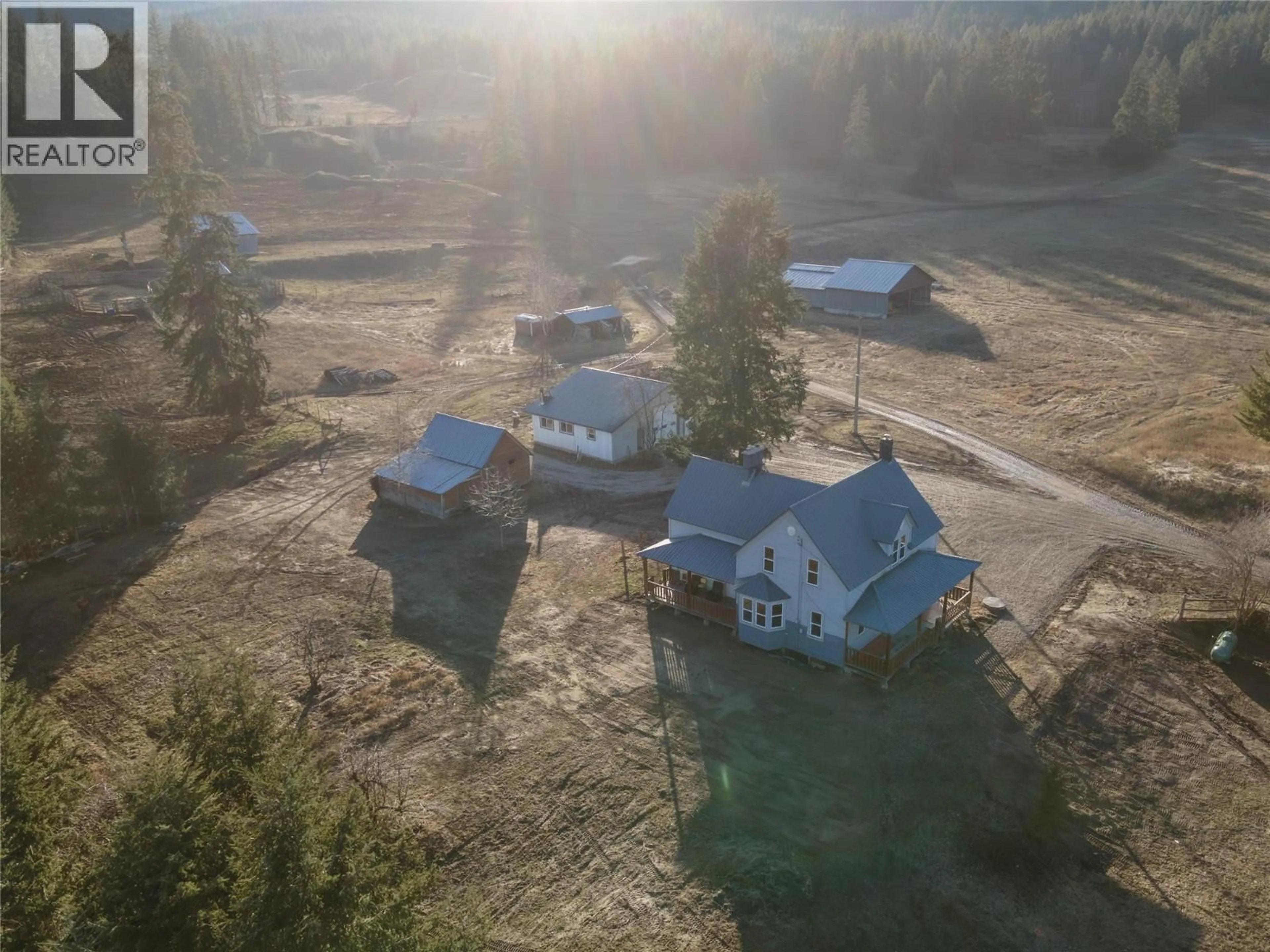 A pic from outside/outdoor area/front of a property/back of a property/a pic from drone, mountain view for 3135 EDES ROAD, Salmon Arm British Columbia V1E3E9