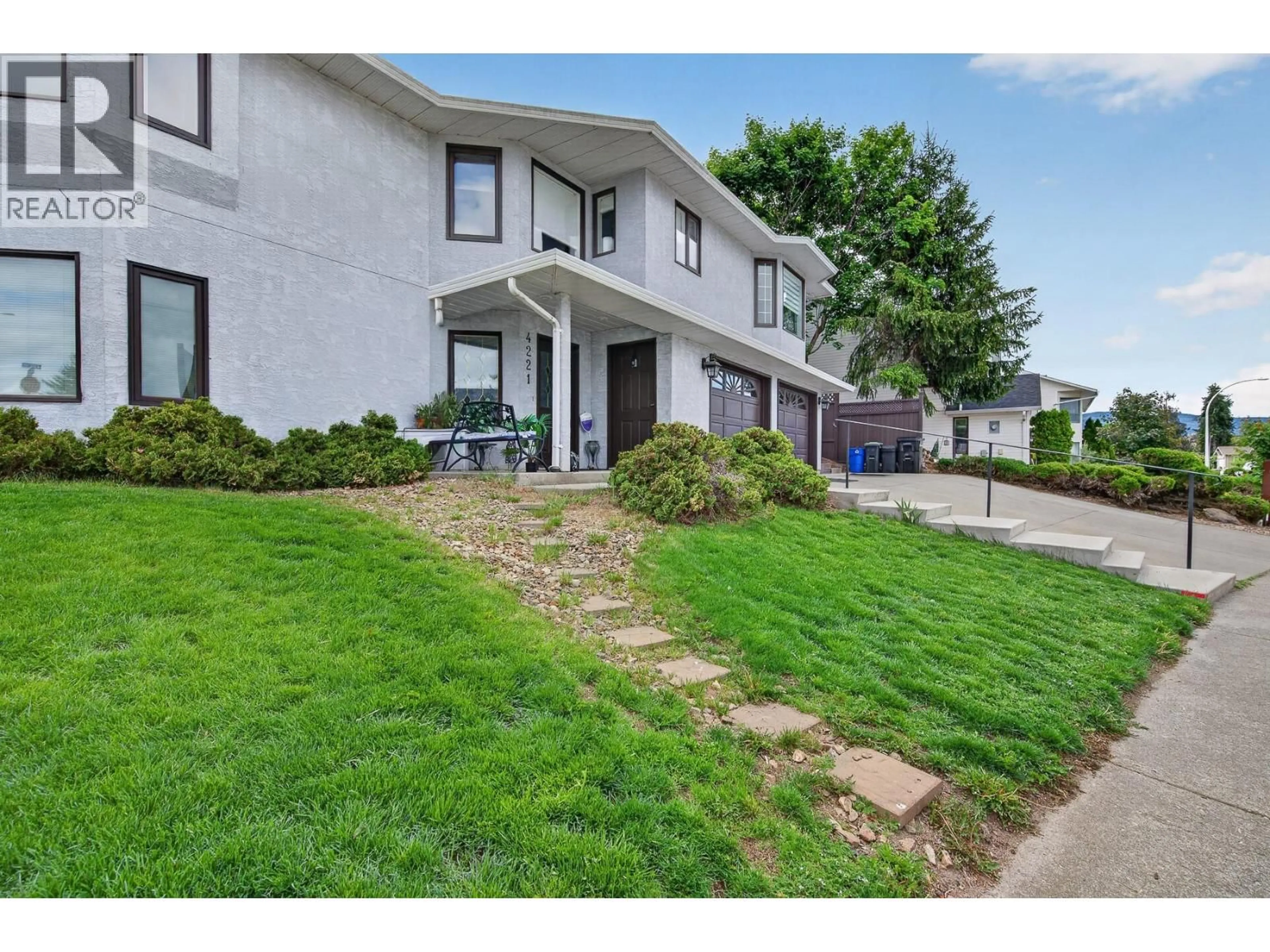 A pic from outside/outdoor area/front of a property/back of a property/a pic from drone, street for 4221 WELLINGTON DRIVE, Vernon British Columbia V1T9H7