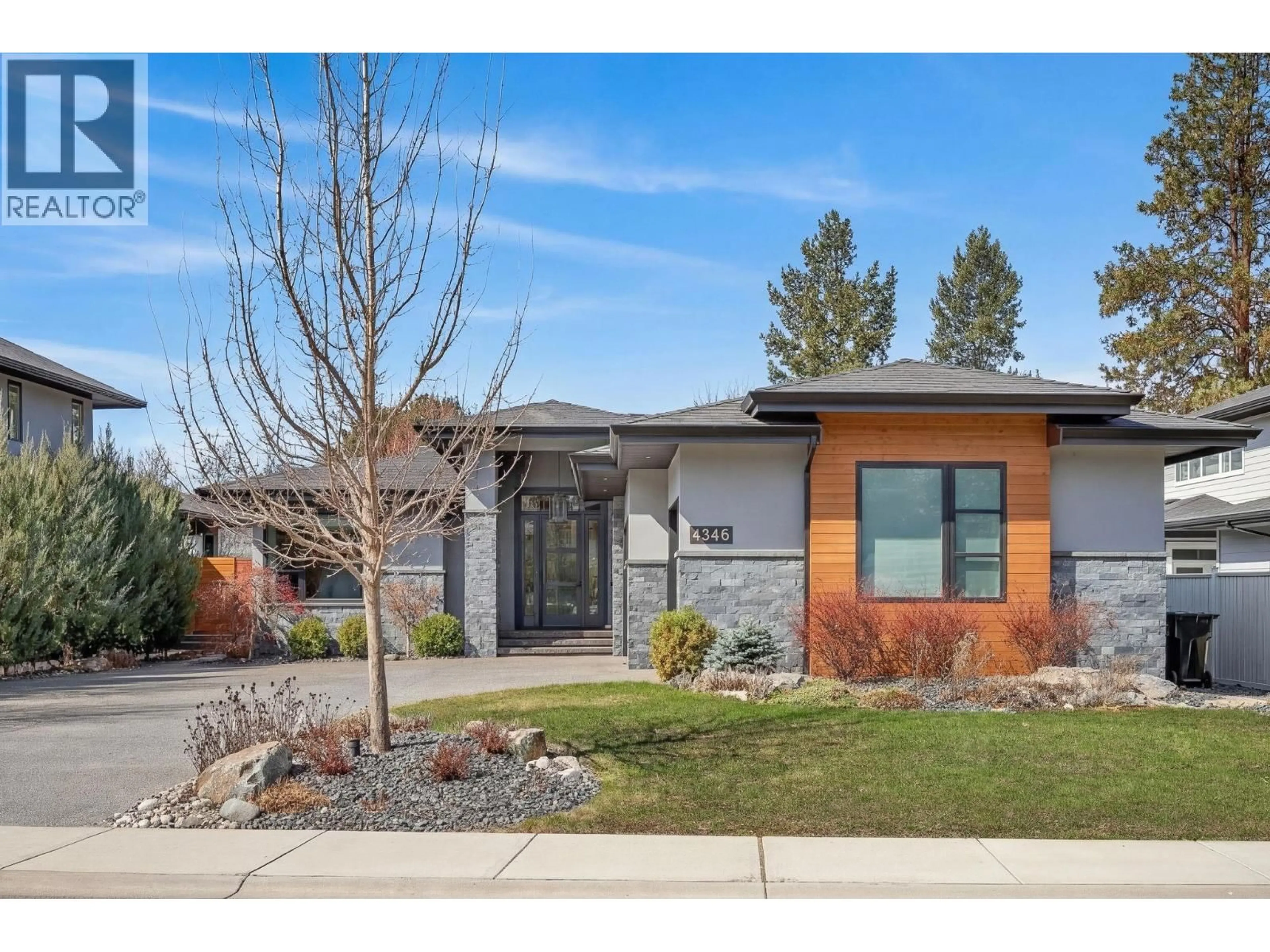 Home with brick exterior material, street for 4346 ULEY ROAD, Kelowna British Columbia V1W5M7