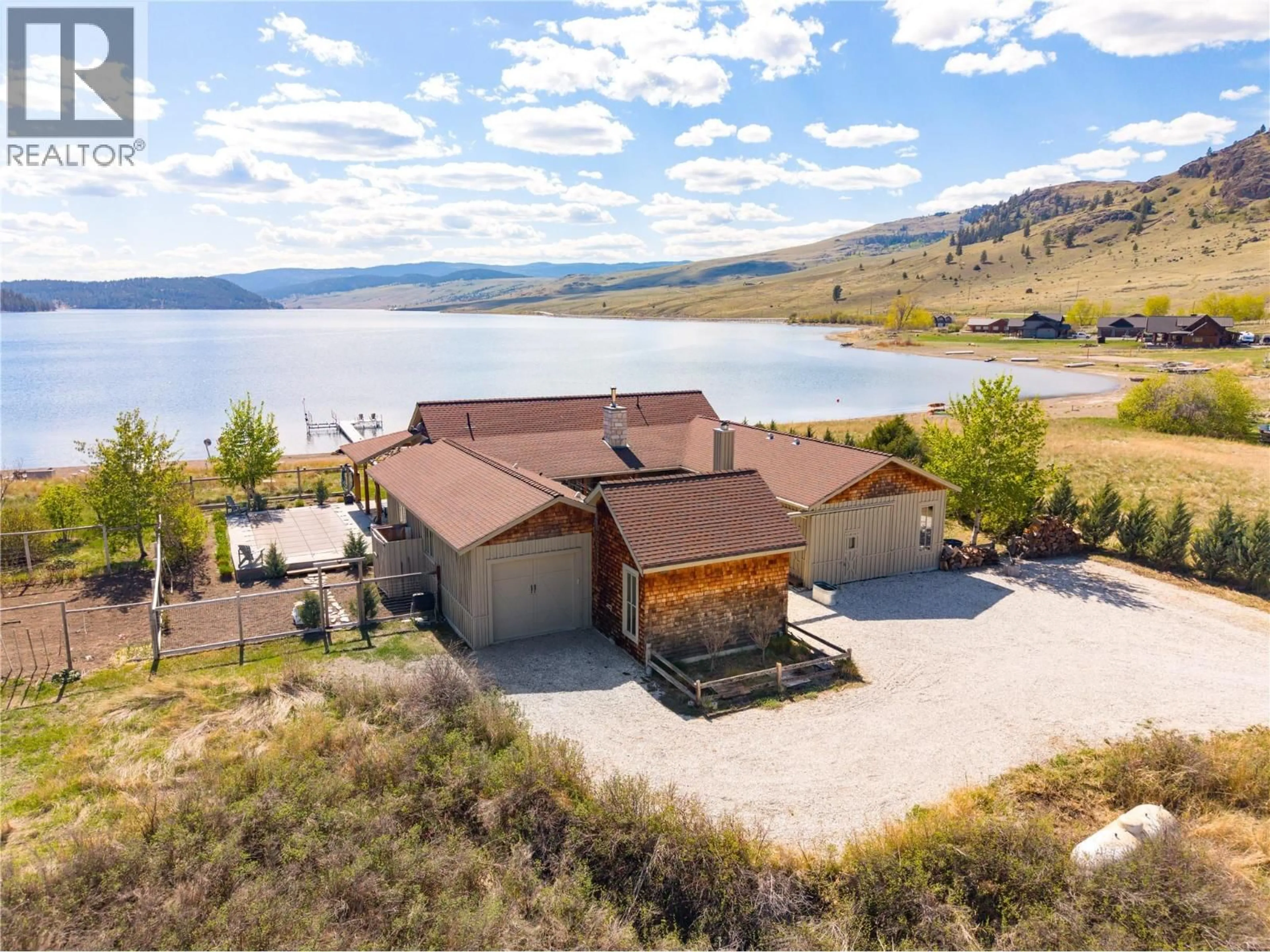 A pic from outside/outdoor area/front of a property/back of a property/a pic from drone, water/lake/river/ocean view for 140 GOLDEN QUILL TRAIL, Stump Lake British Columbia V0E2A0