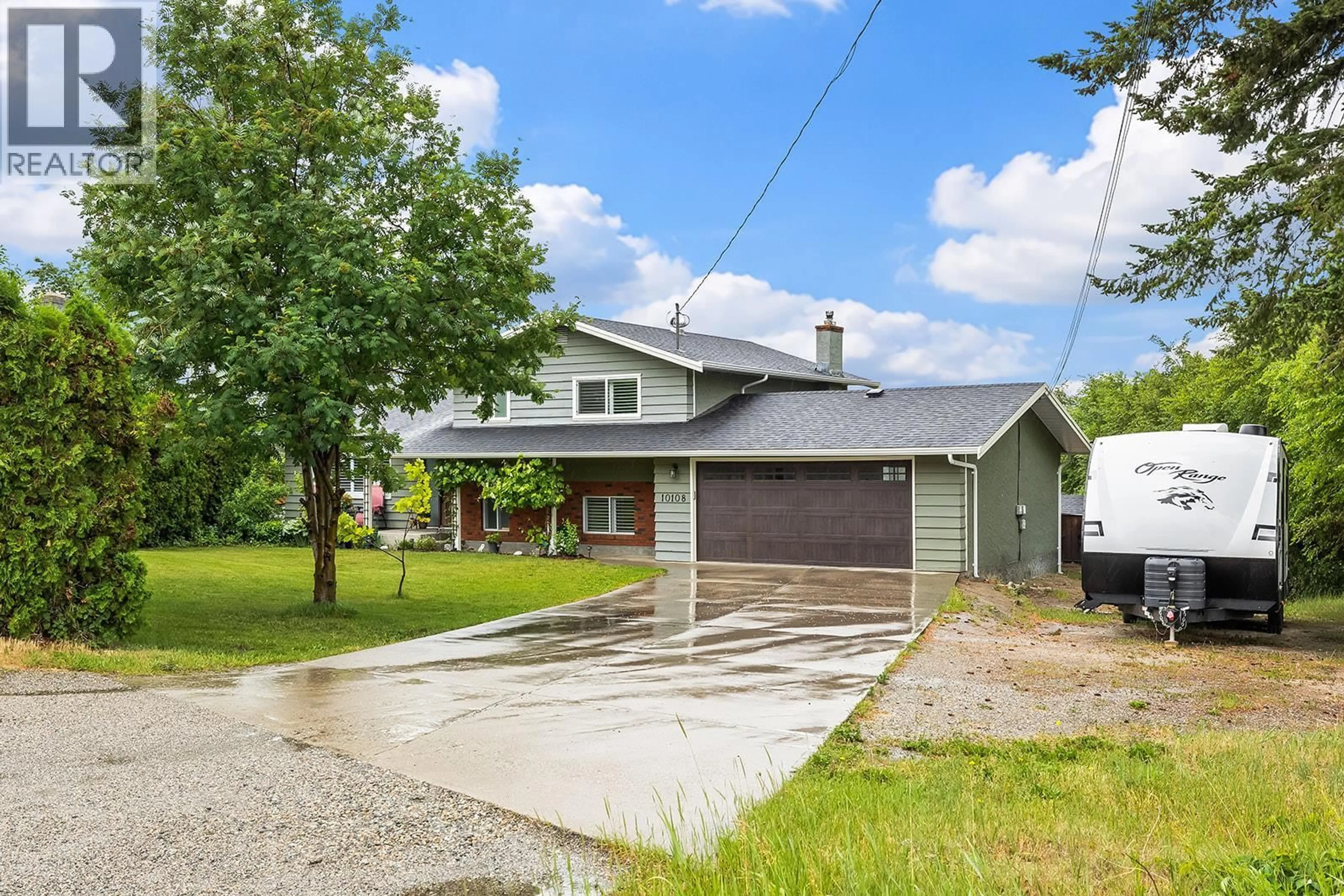 A pic from outside/outdoor area/front of a property/back of a property/a pic from drone, street for 10108 KEL VERN CRESCENT, Lake Country British Columbia V4V1L3