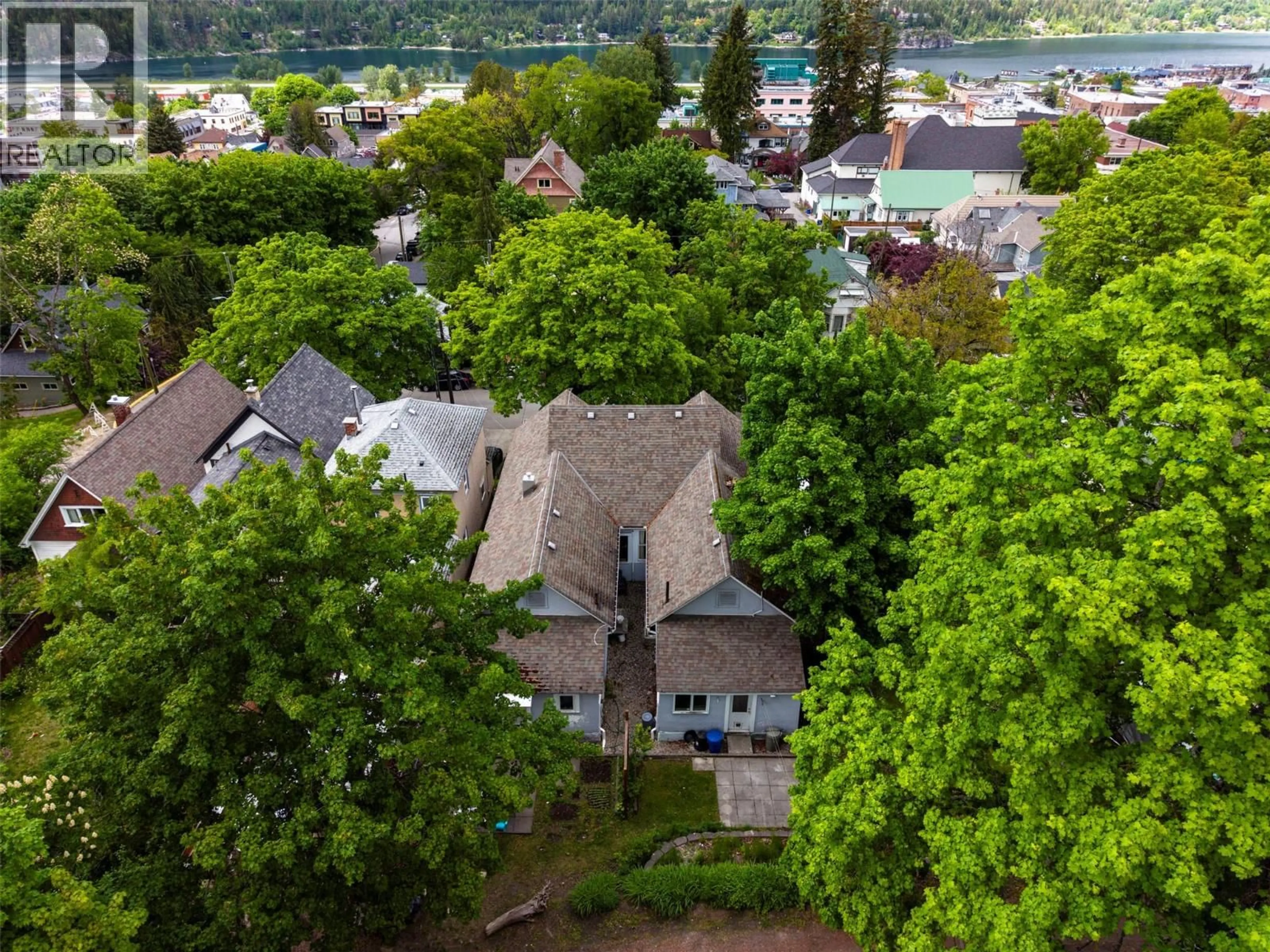 A pic from outside/outdoor area/front of a property/back of a property/a pic from drone, unknown for 308/310 CARBONATE STREET, Nelson British Columbia V1L4P2