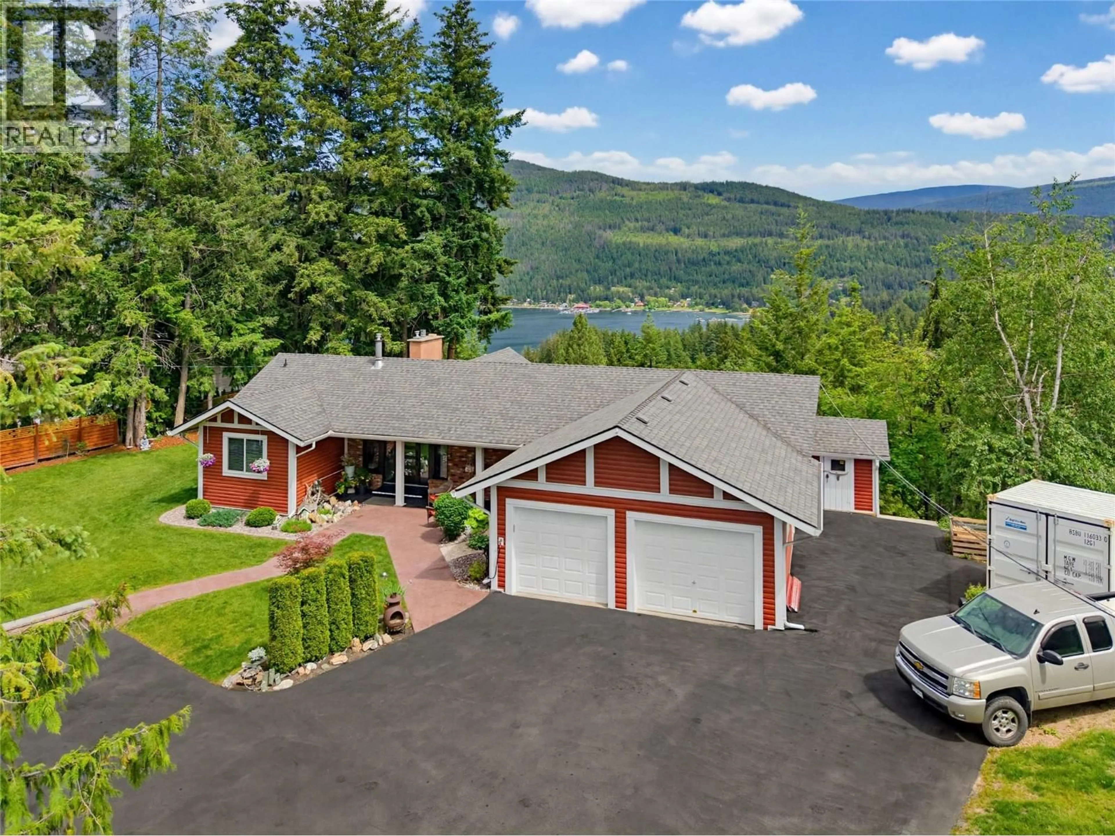 A pic from outside/outdoor area/front of a property/back of a property/a pic from drone, water/lake/river/ocean view for 2414 FOREST DRIVE, Blind Bay British Columbia V0E1H2