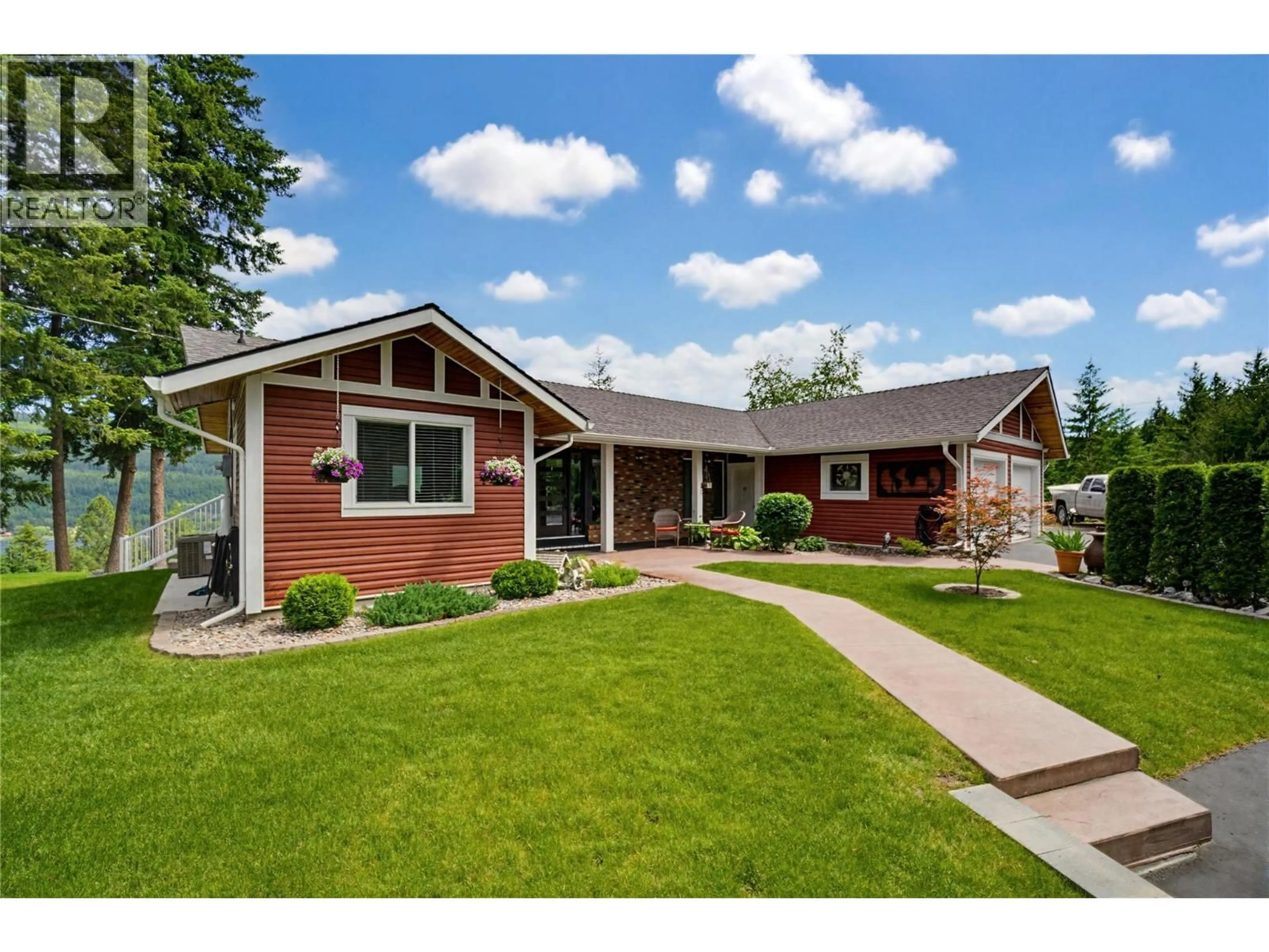 Home with brick exterior material, street for 2414 FOREST DRIVE, Blind Bay British Columbia V0E1H2