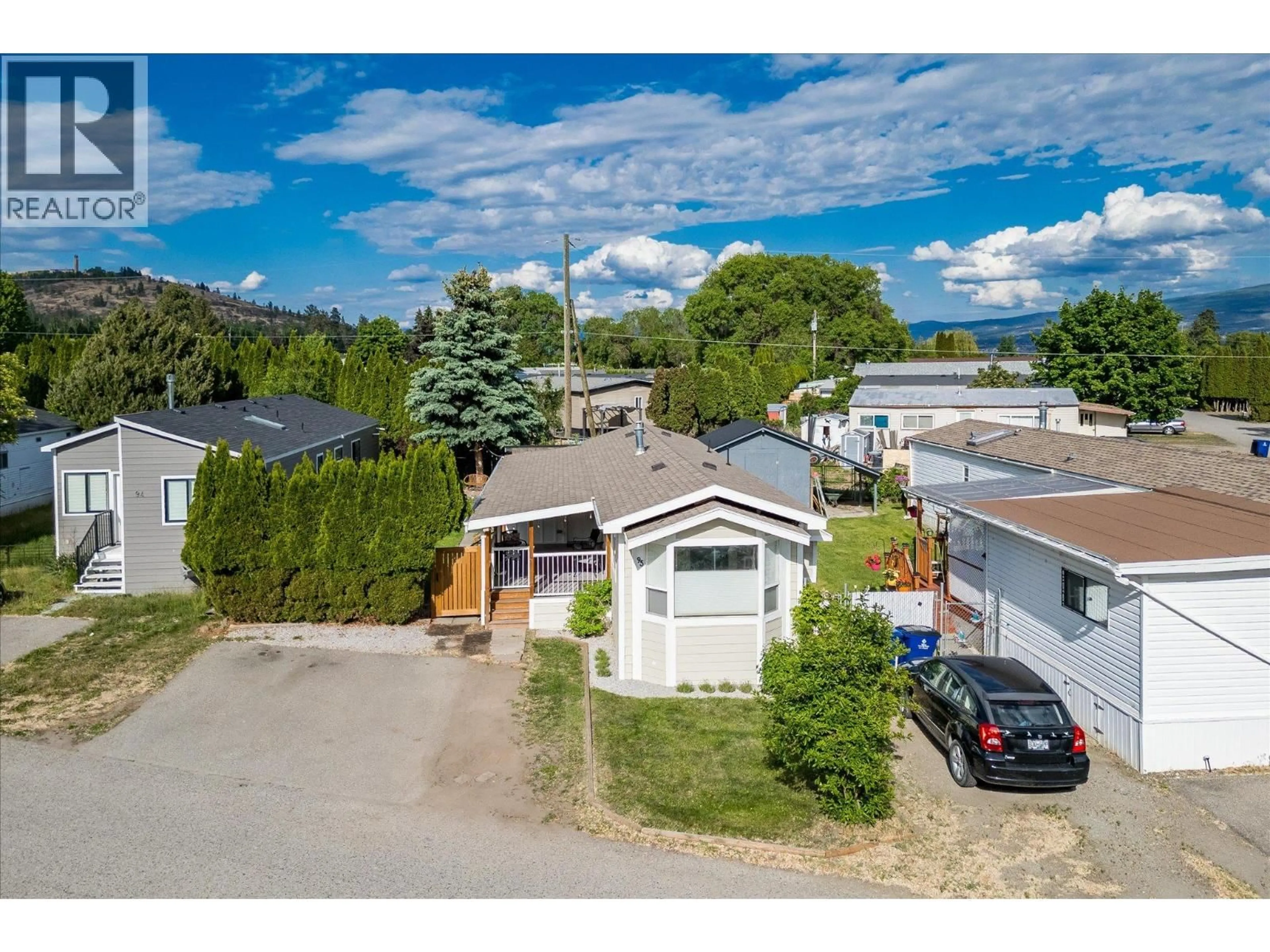 A pic from outside/outdoor area/front of a property/back of a property/a pic from drone, water/lake/river/ocean view for 95 - 2035 BOUCHERIE ROAD, West Kelowna British Columbia V4T1Z8