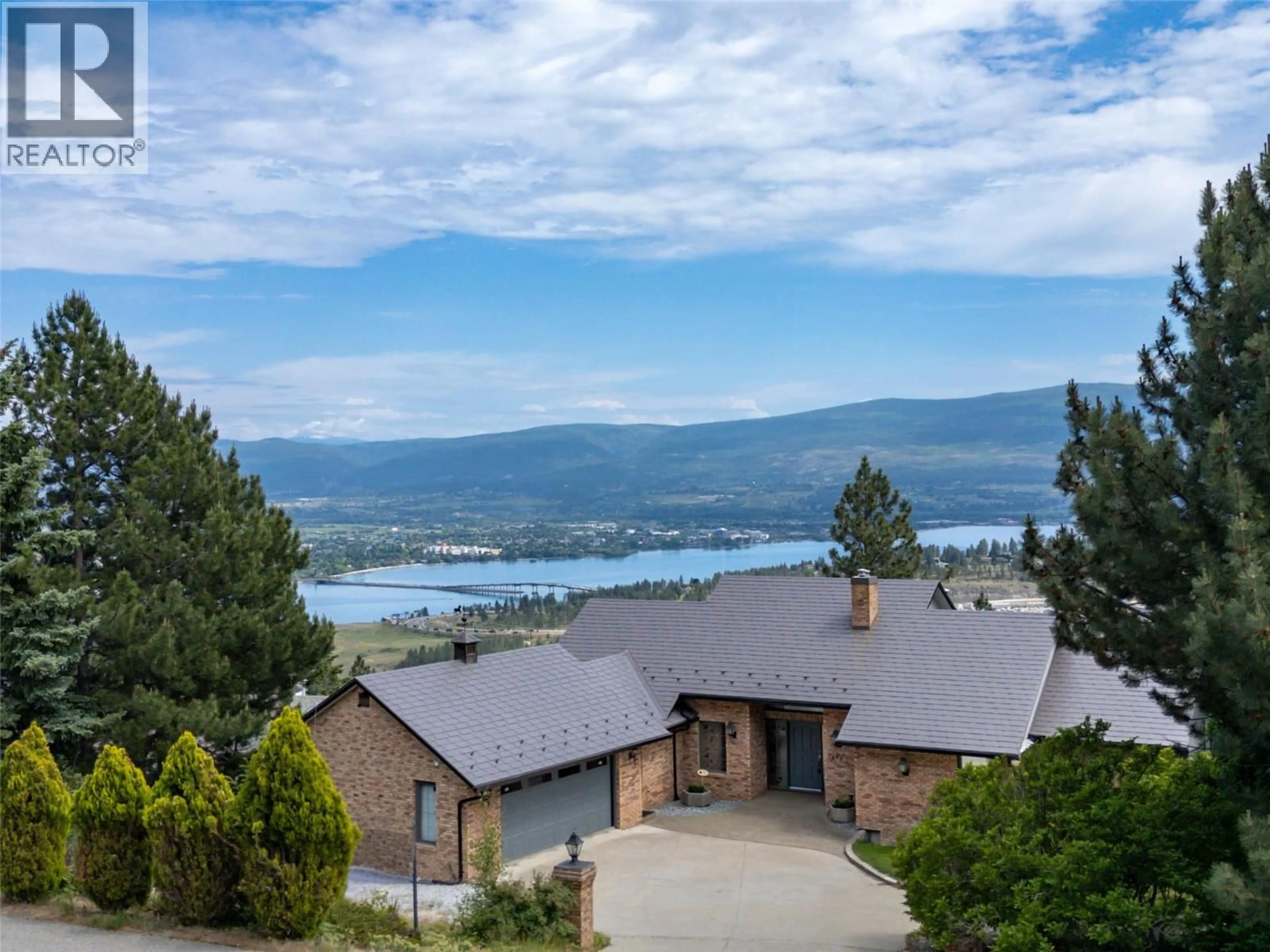 A pic from outside/outdoor area/front of a property/back of a property/a pic from drone, mountain view for 1525 KLEIN ROAD, West Kelowna British Columbia V1Z3H5