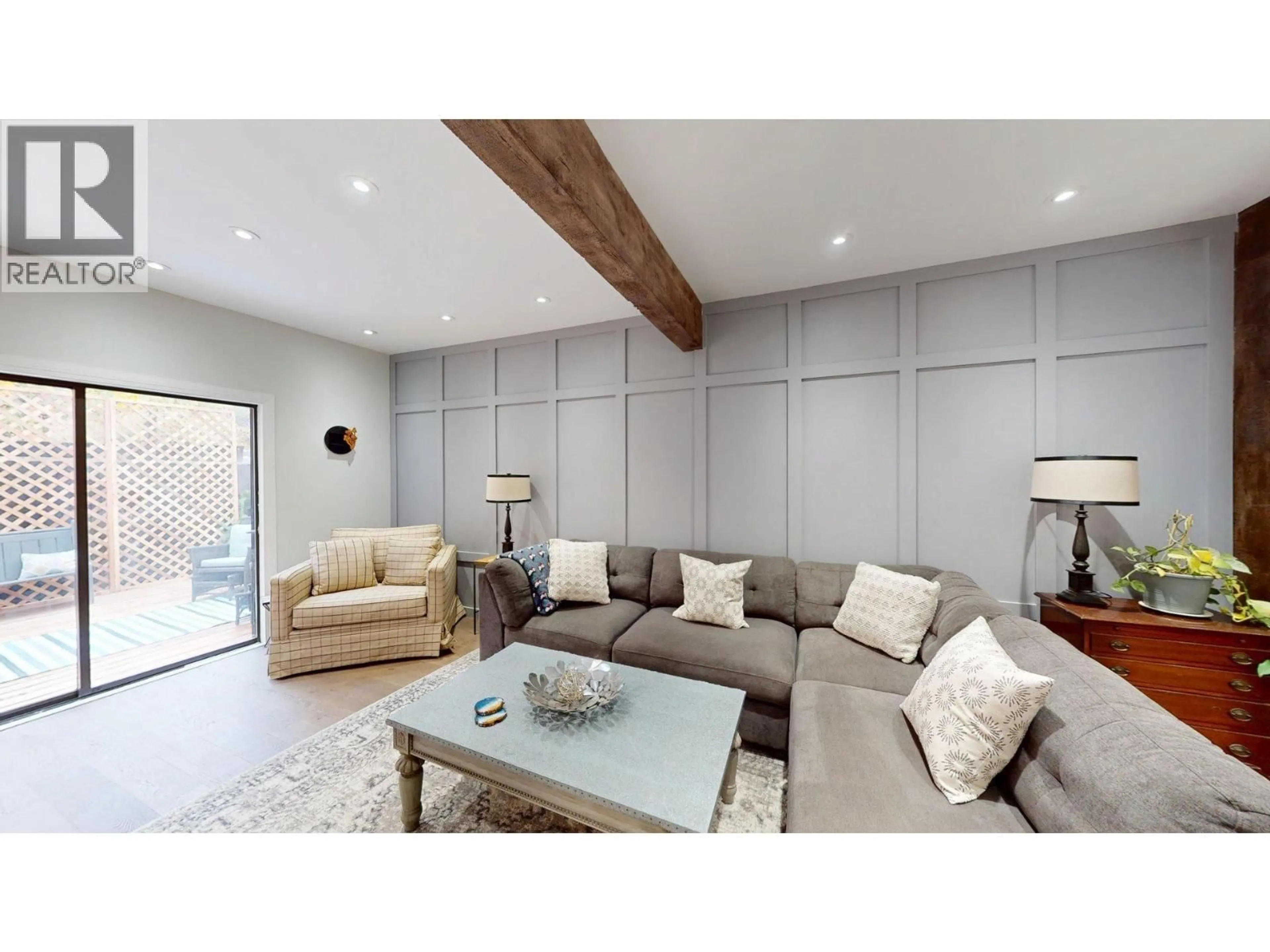 Living room with furniture, wood/laminate floor for 1925 KOOTENAY AVENUE, Rossland British Columbia V0G1Y0