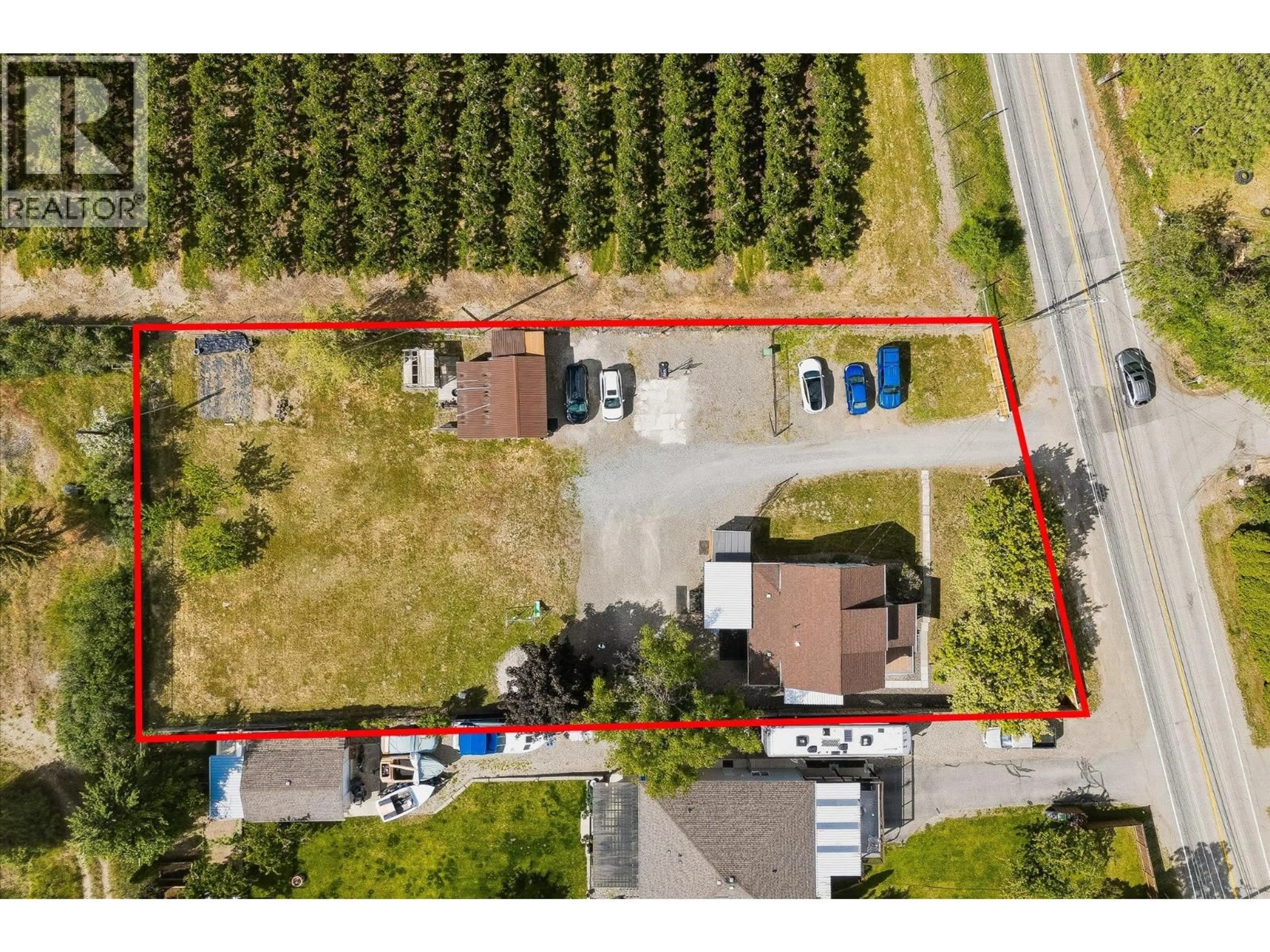 A pic from outside/outdoor area/front of a property/back of a property/a pic from drone, street for 11592 OKANAGAN CENTRE ROAD EAST, Lake Country British Columbia V4V1G4