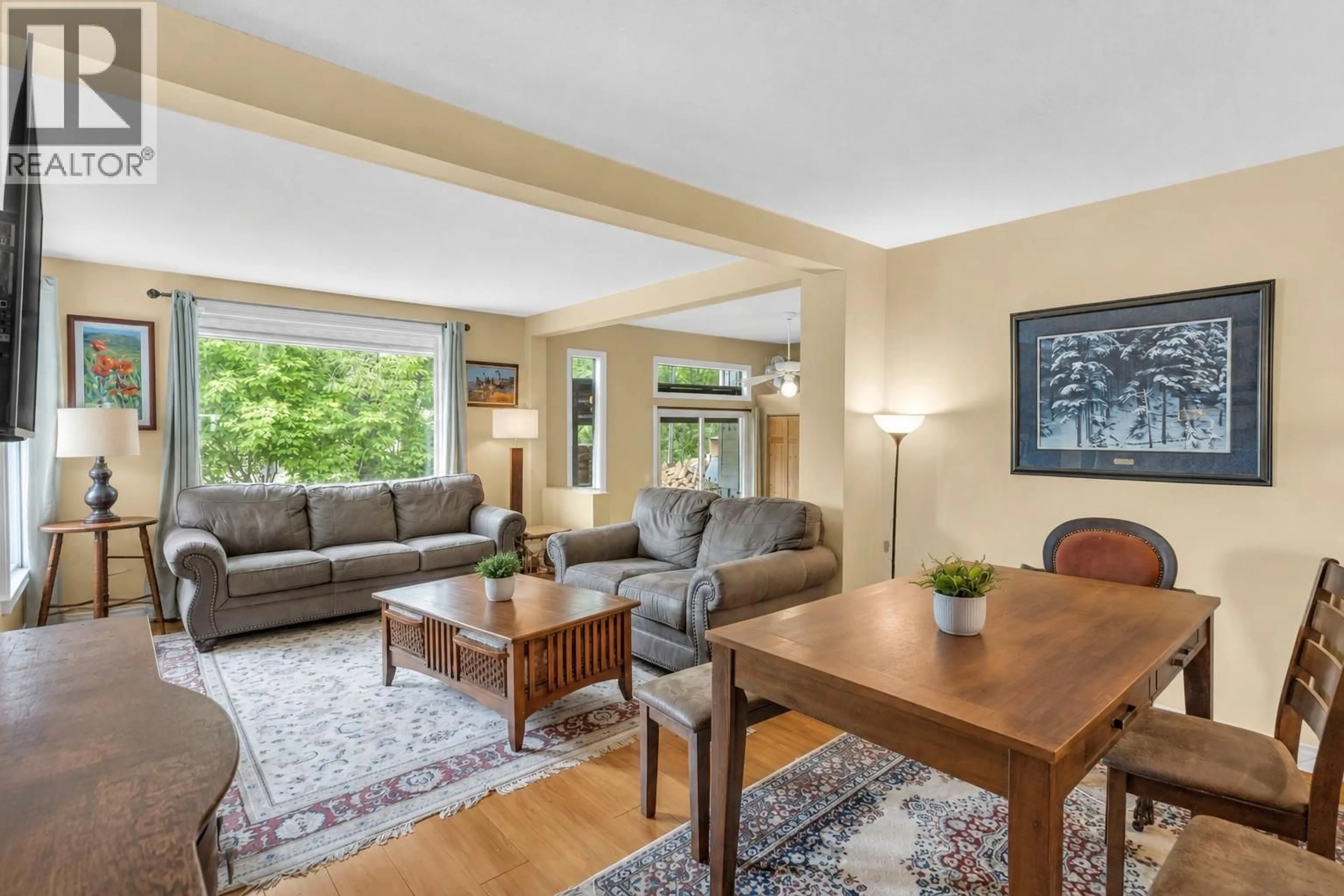 Living room with furniture, wood/laminate floor for 1967 ABBOTT STREET, Kelowna British Columbia V1Y1B8