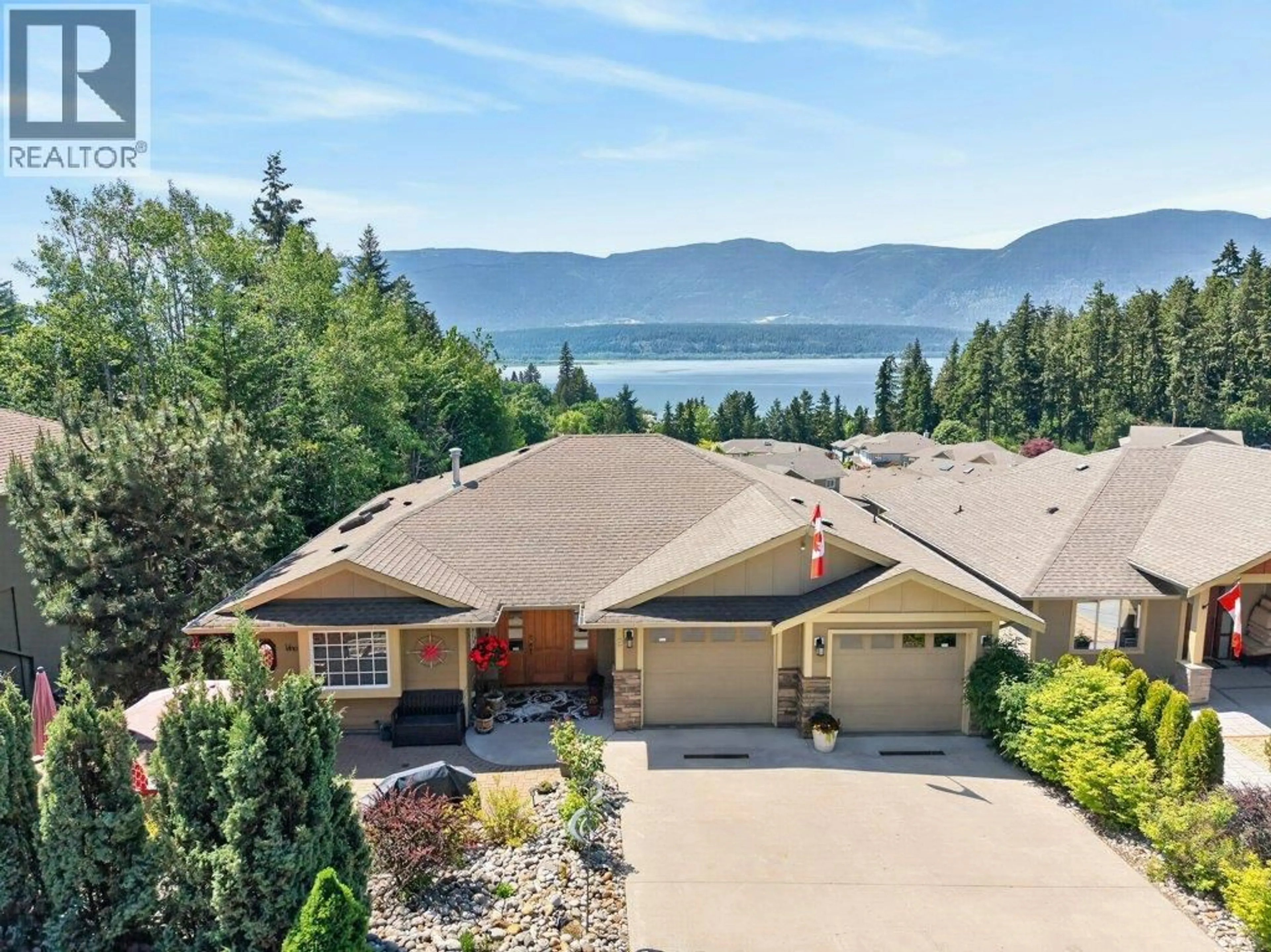 A pic from outside/outdoor area/front of a property/back of a property/a pic from drone, water/lake/river/ocean view for 2 - 1581 20 STREET NORTHEAST, Salmon Arm British Columbia V1E0A7