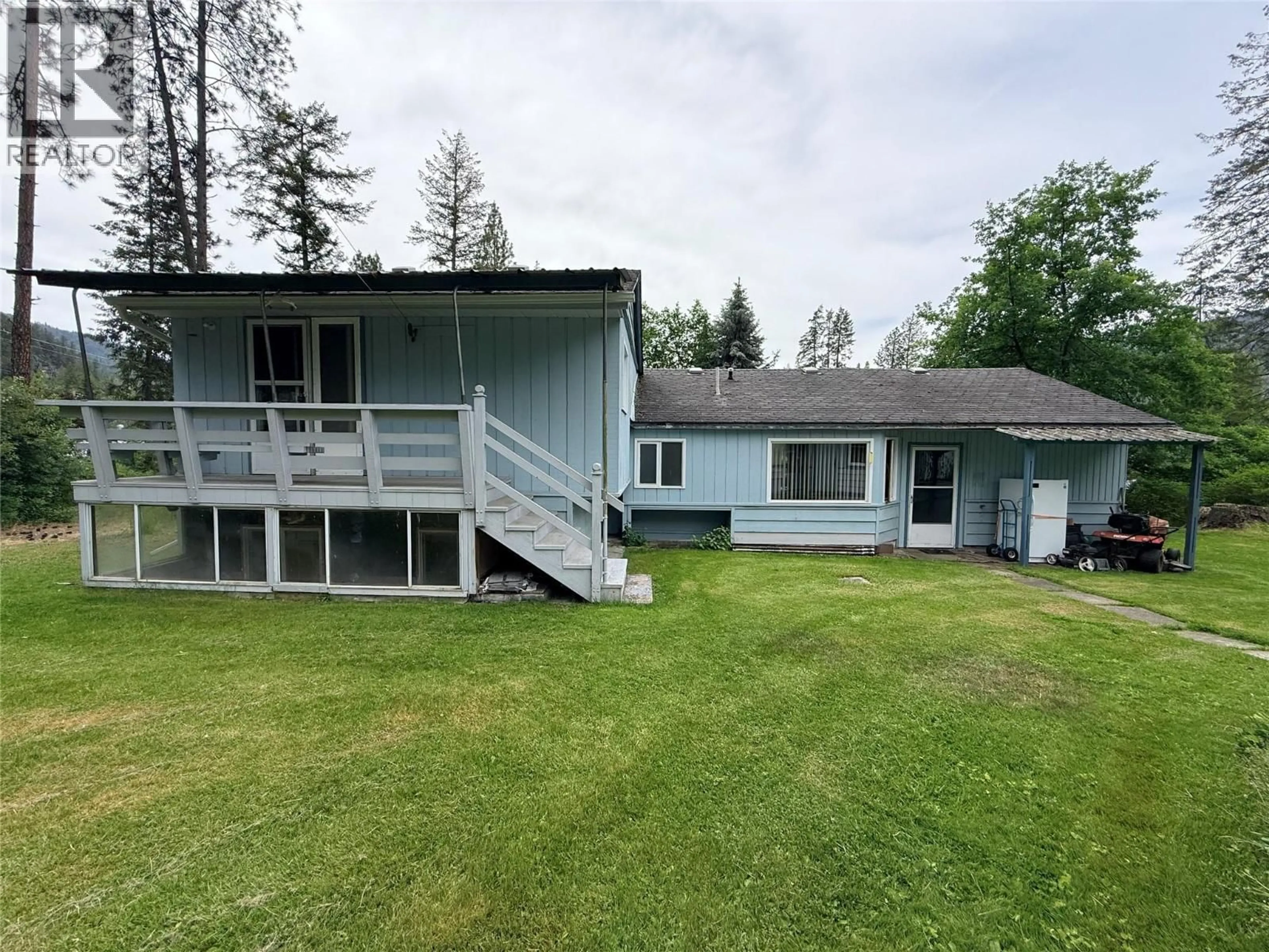 A pic from outside/outdoor area/front of a property/back of a property/a pic from drone, unknown for 1980 3 HIGHWAY, Christina Lake British Columbia V0H1E2