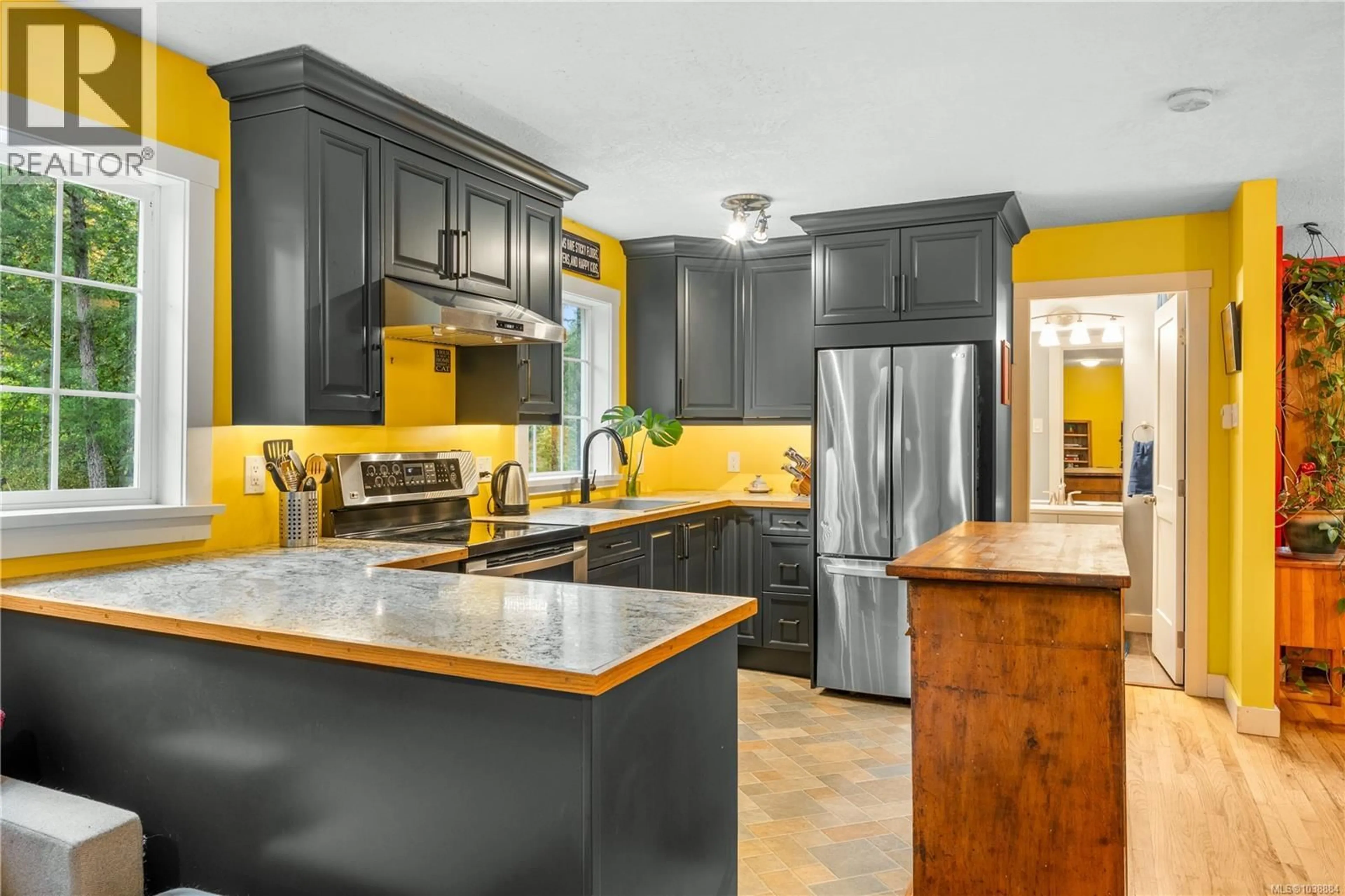 Contemporary kitchen, ceramic/tile floor for 5708 RIVER VALLEY ROAD, Duncan British Columbia V9L6H8