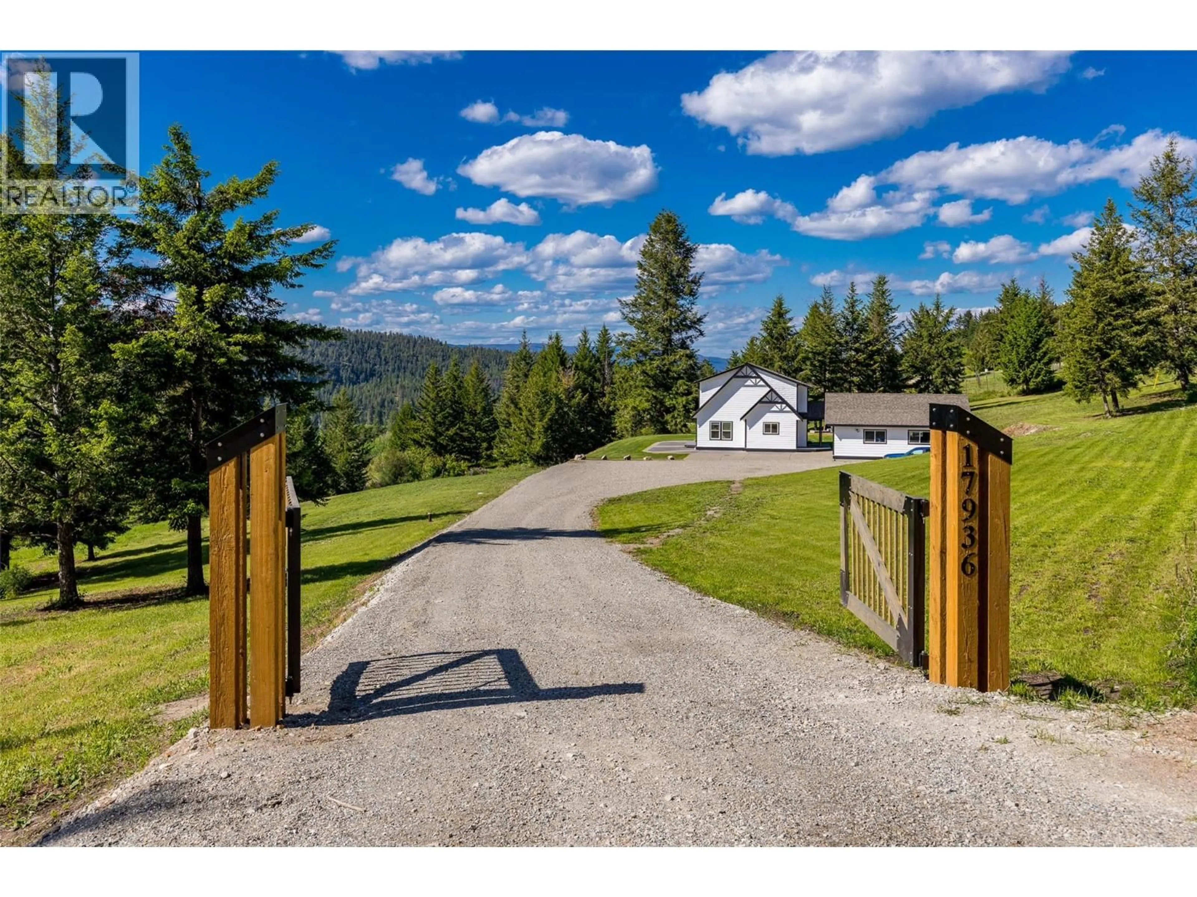 A pic from outside/outdoor area/front of a property/back of a property/a pic from drone, mountain view for 17936 ANGUS ROAD, Lake Country British Columbia V4V1B6