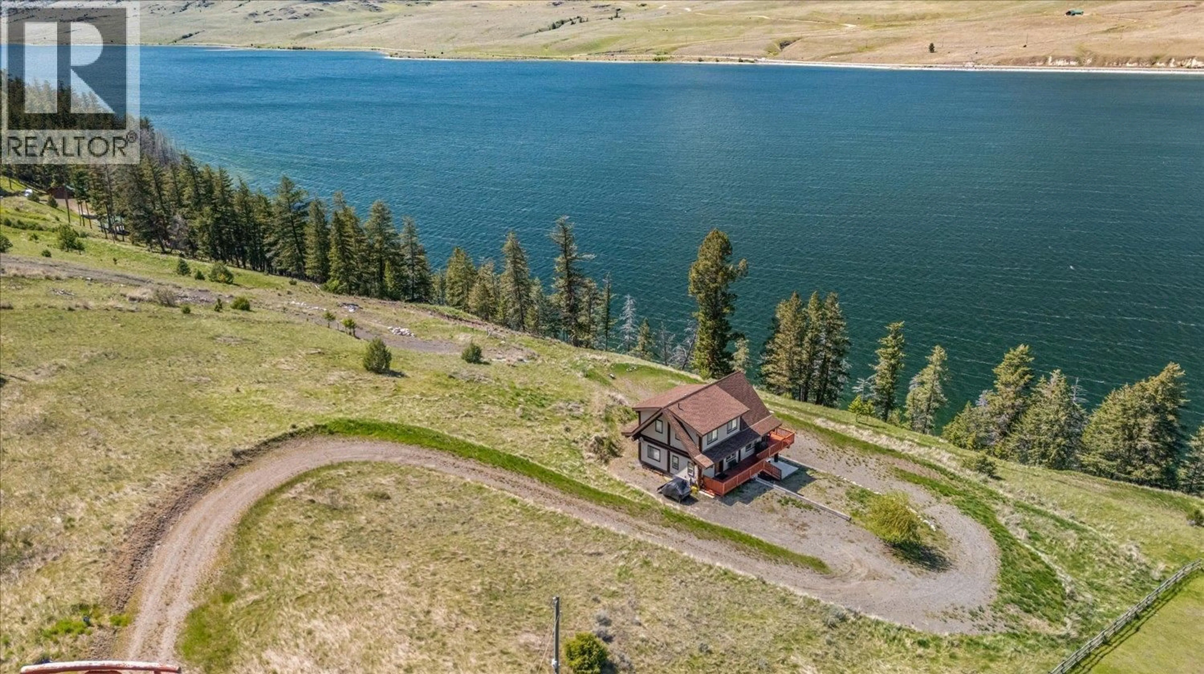 A pic from outside/outdoor area/front of a property/back of a property/a pic from drone, water/lake/river/ocean view for 8605 OLD KAMLOOPS ROAD, Stump Lake British Columbia V0E2A0