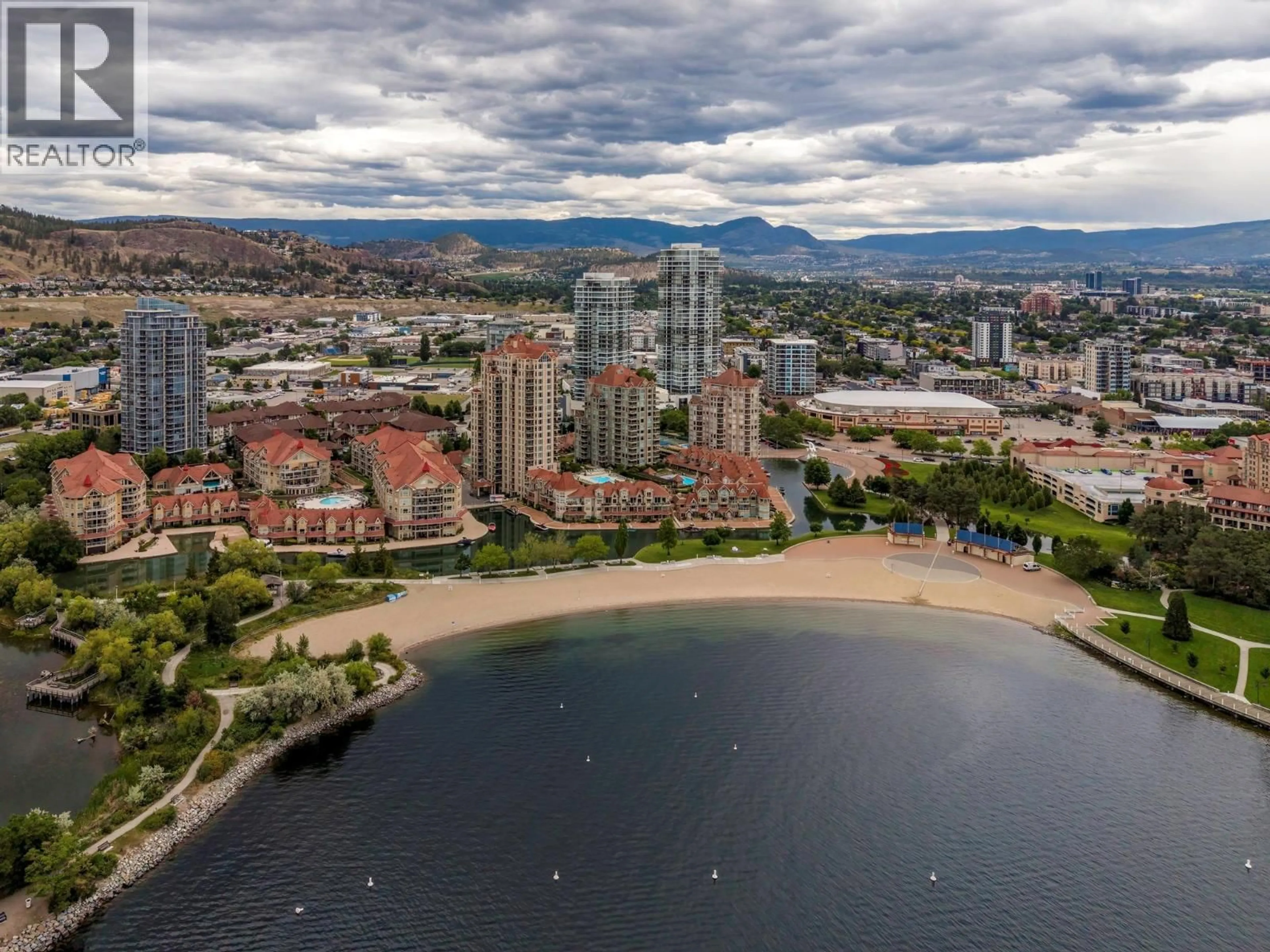 A pic from outside/outdoor area/front of a property/back of a property/a pic from drone, water/lake/river/ocean view for 2603 - 1075 SUNSET DRIVE, Kelowna British Columbia V1Y9Y9