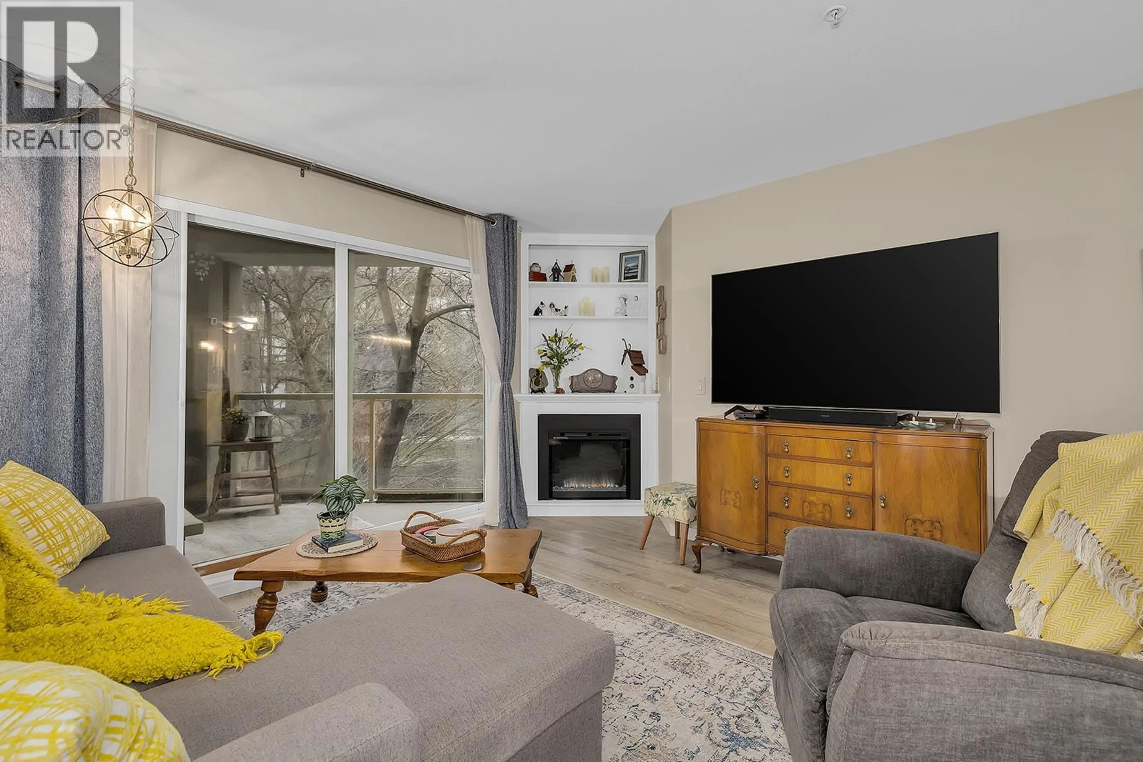Living room with furniture, unknown for 103 - 1965 PANDOSY STREET, Kelowna British Columbia V1Y1R9