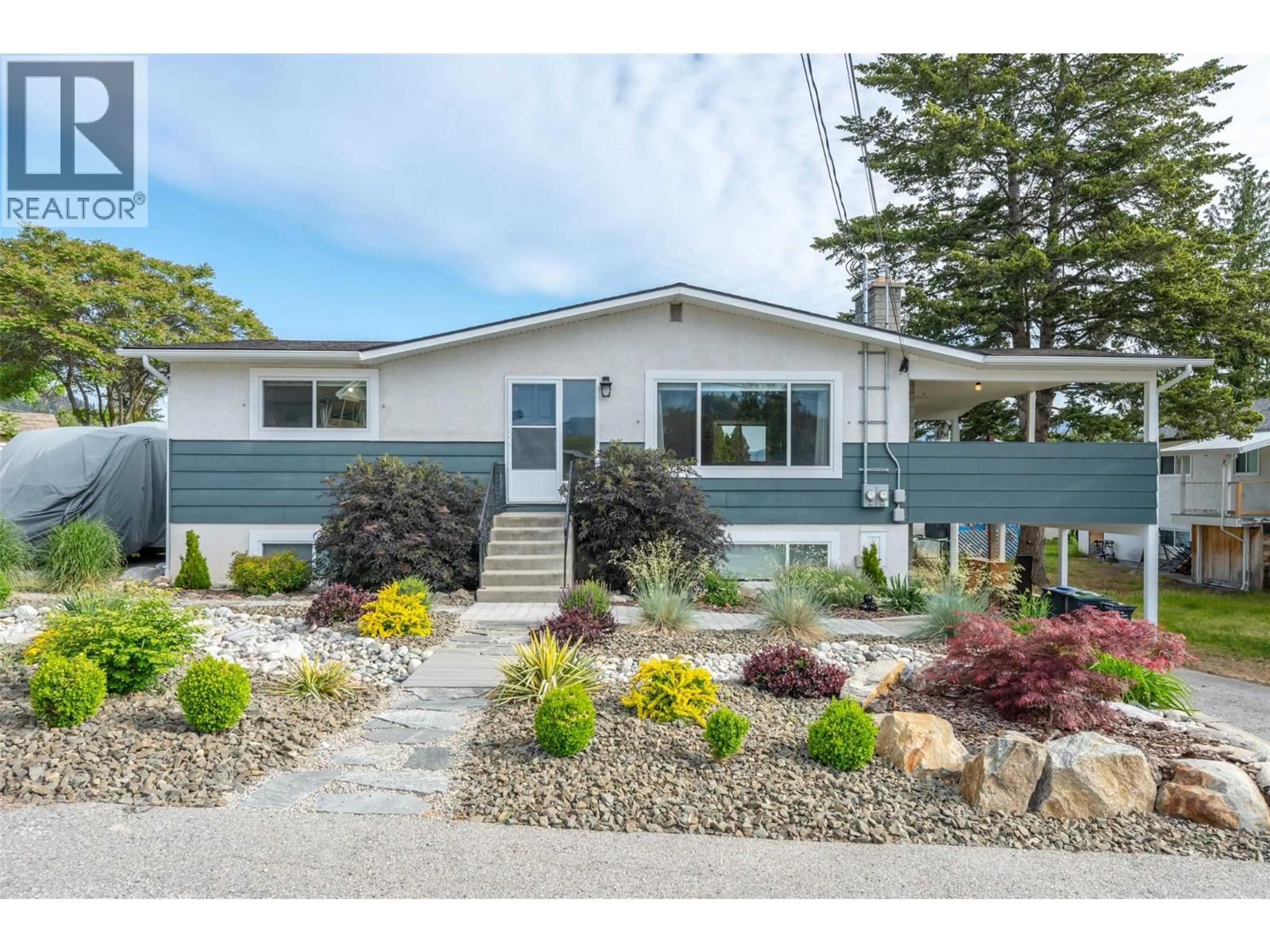 Home with vinyl exterior material, street for 11512 HARVEY STREET, Summerland British Columbia V0h1Z0