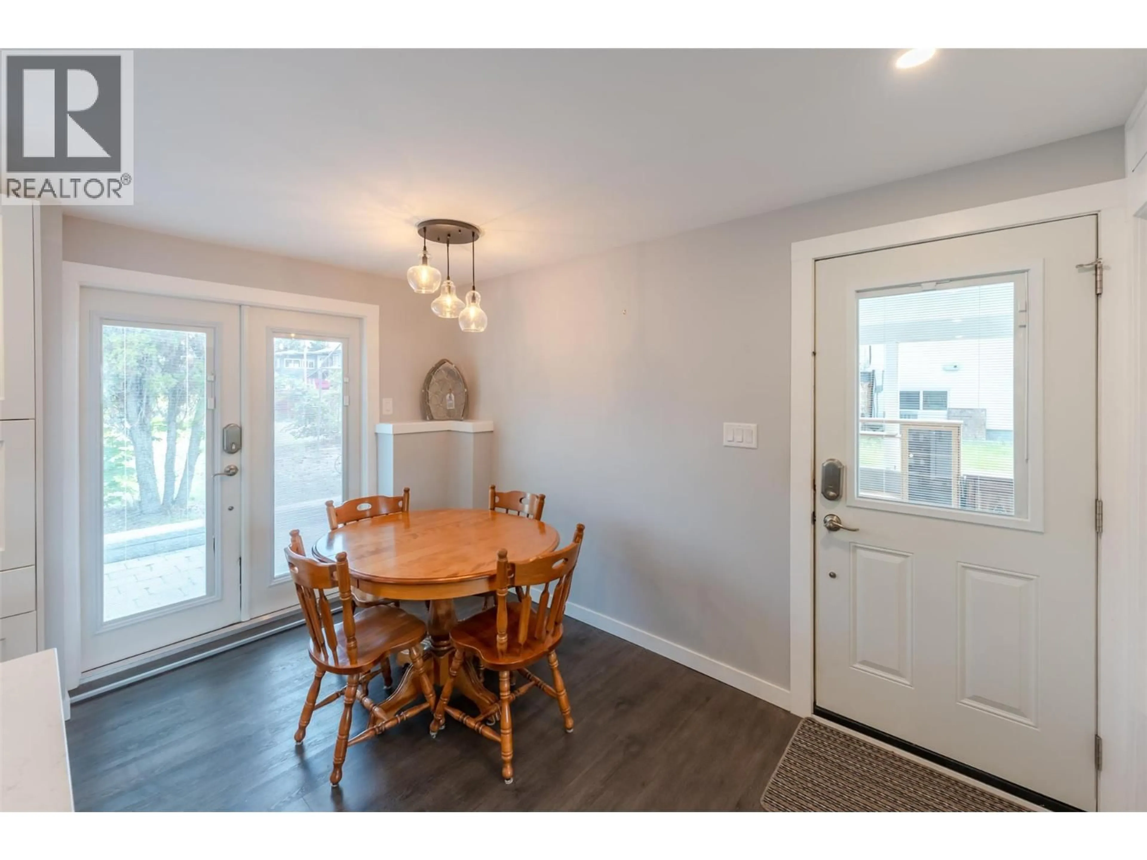Dining room, wood/laminate floor for 11512 HARVEY STREET, Summerland British Columbia V0h1Z0