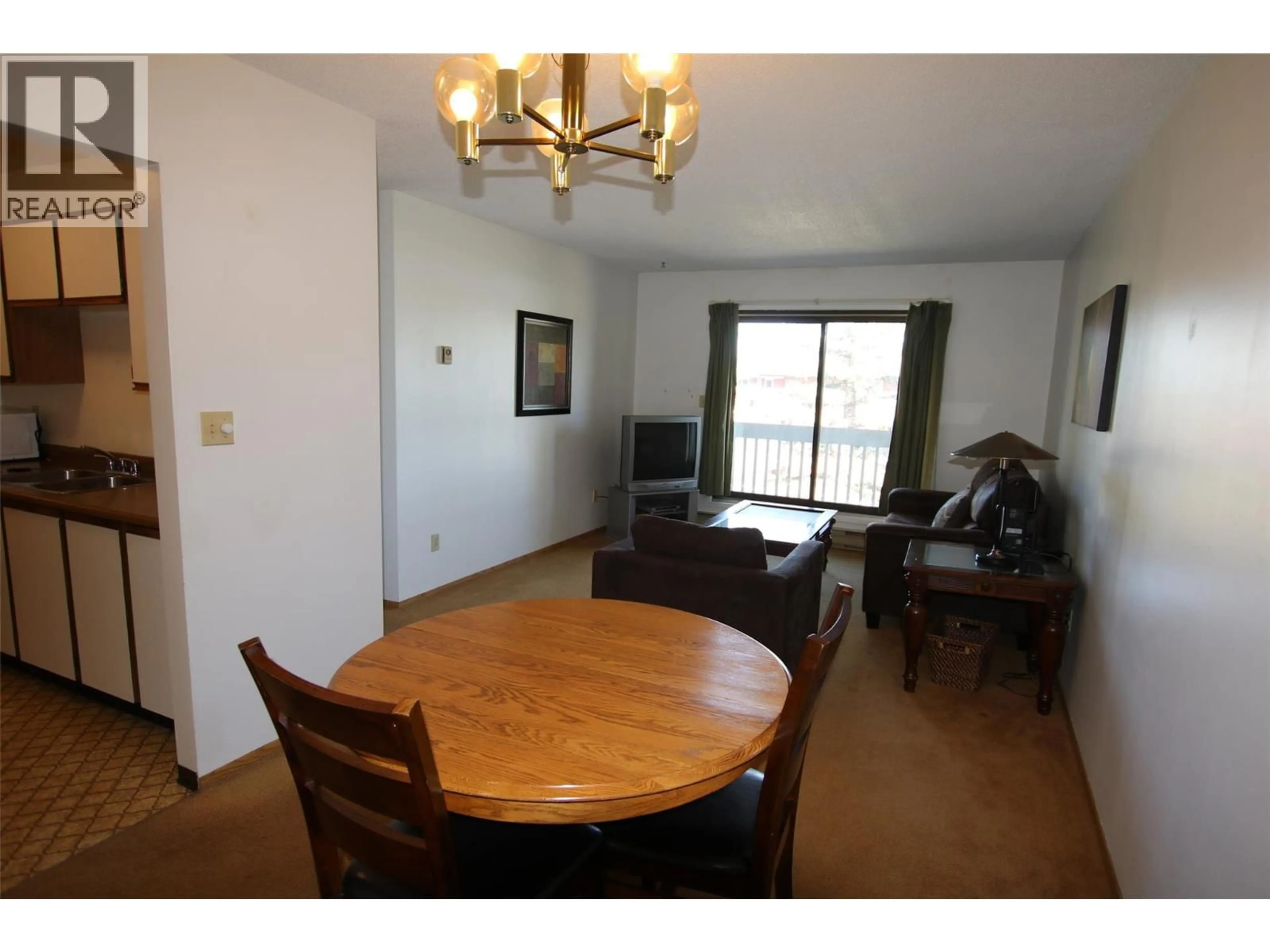 Dining room, wood/laminate floor for 310 - 320 NORTHGATE ROAD, Tumbler Ridge British Columbia V0C2W0