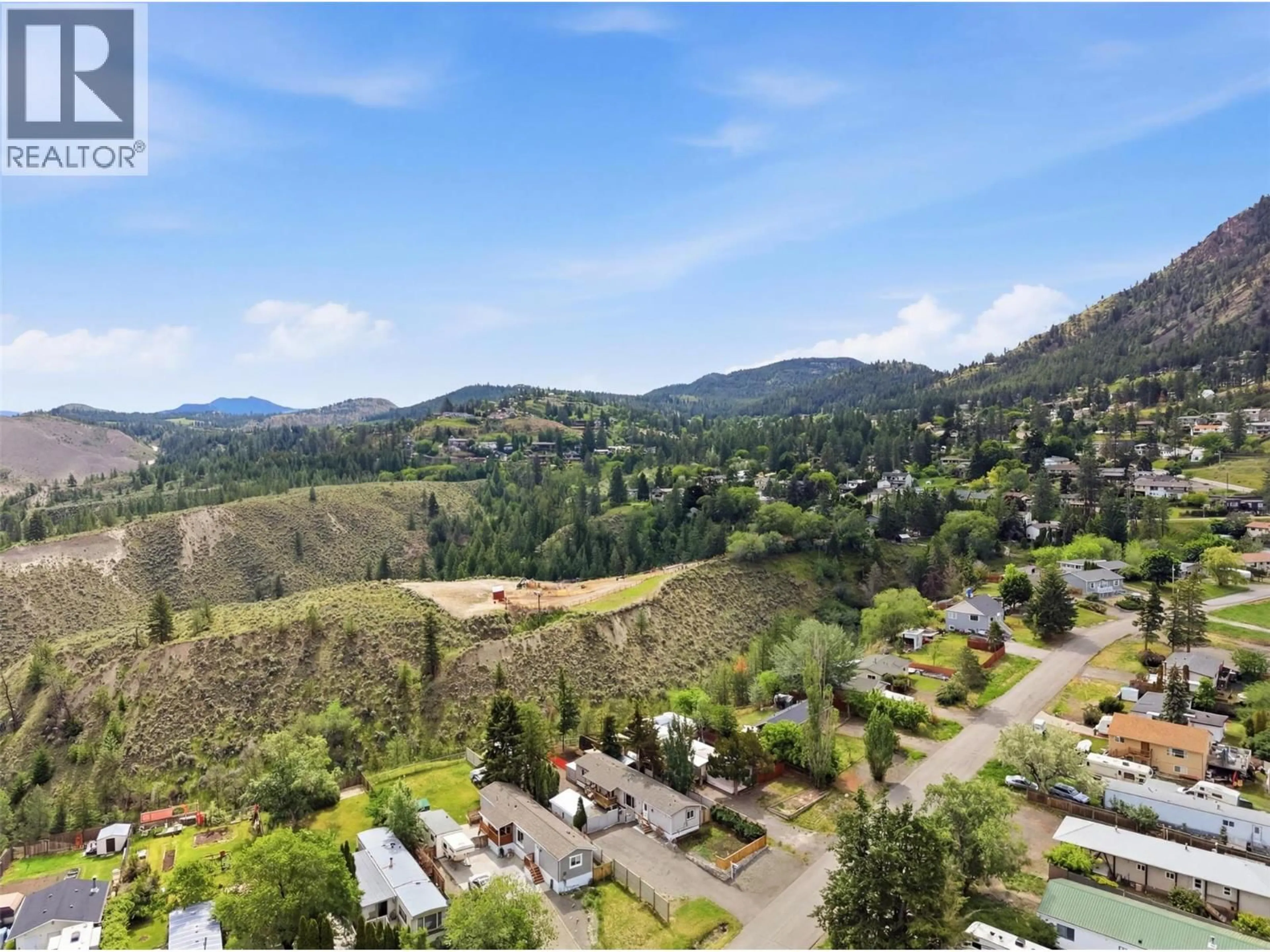 A pic from outside/outdoor area/front of a property/back of a property/a pic from drone, mountain view for 840 KLAHANIE DRIVE, Kamloops British Columbia V2C5R2