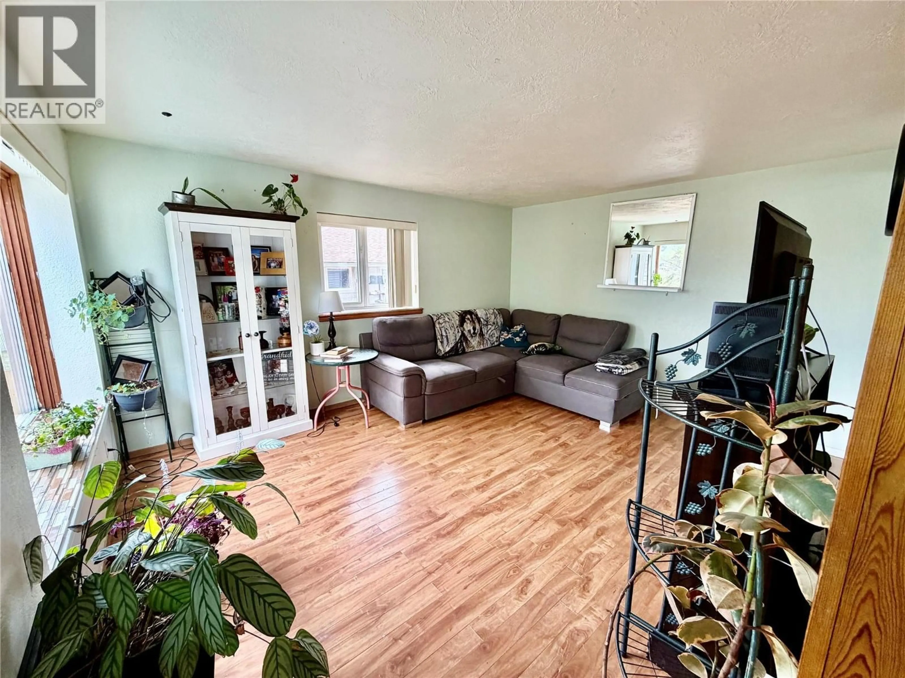 Living room with furniture, unknown for 1501 107 AVENUE, Dawson Creek British Columbia V1G2R9