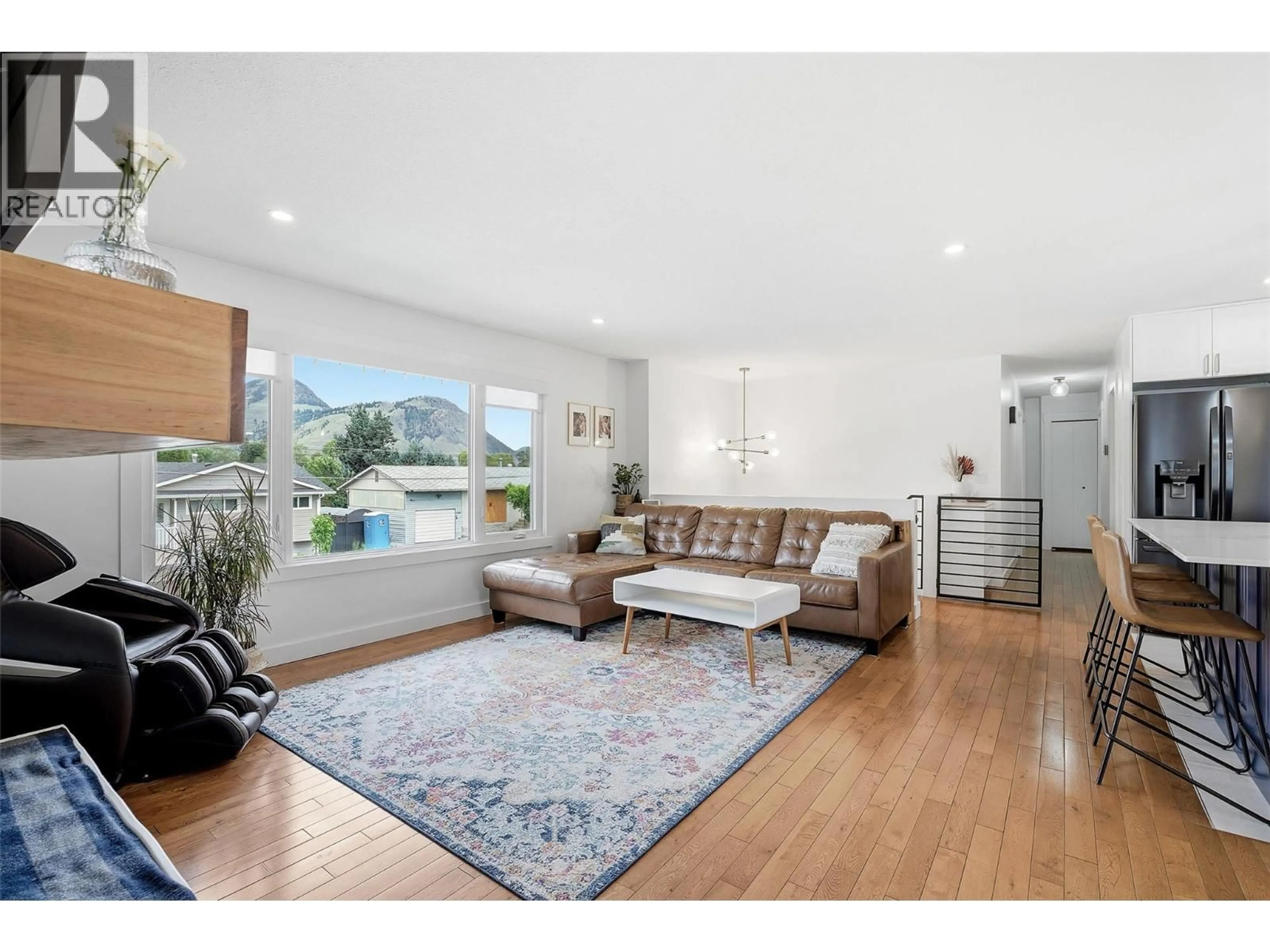 Living room with furniture, wood/laminate floor for 1357 SITKA STREET, Kamloops British Columbia V2B2V8