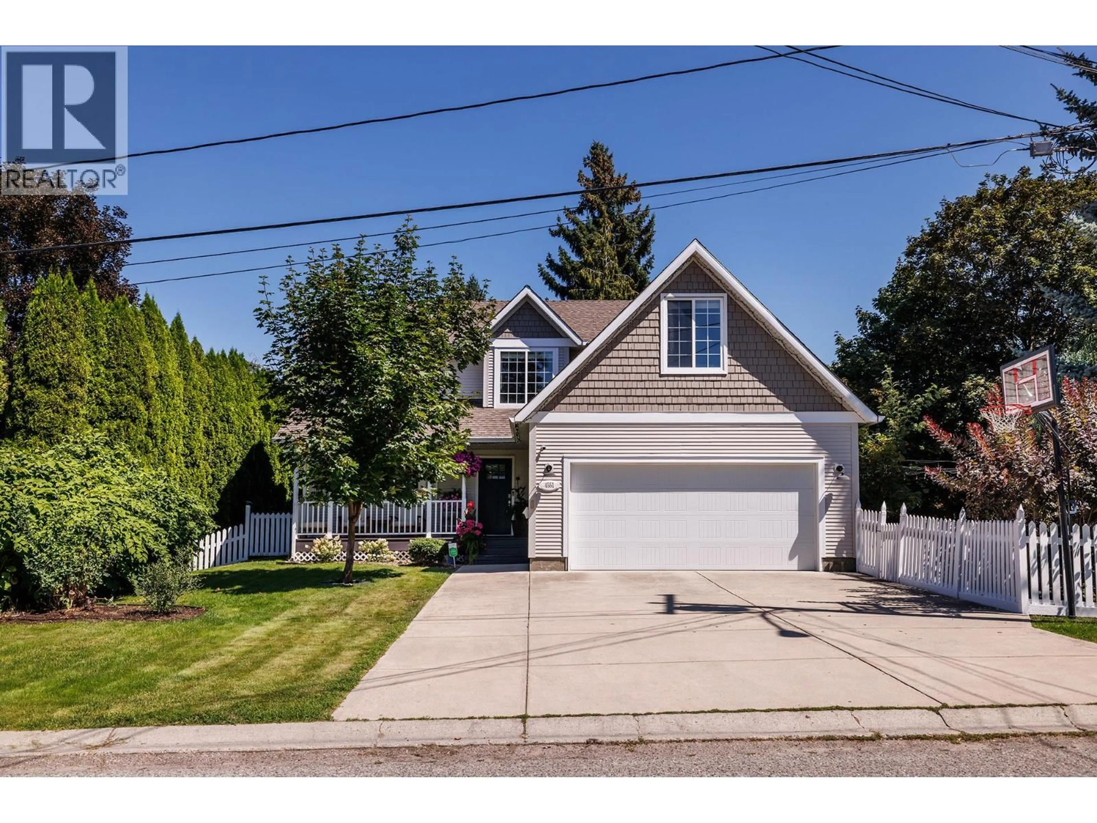 Home with vinyl exterior material, street for 4551 HORAK ROAD, Kelowna British Columbia V1W1S1