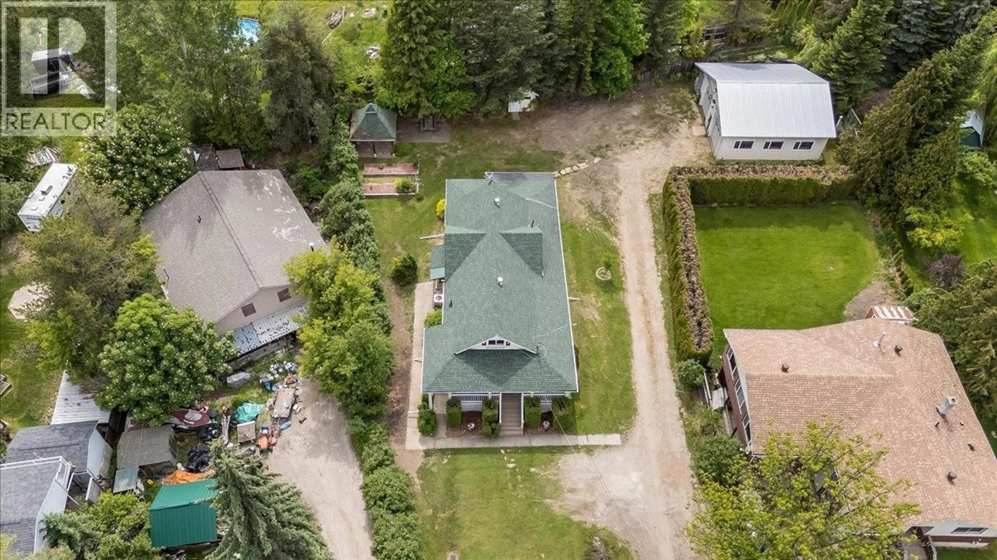 A pic from outside/outdoor area/front of a property/back of a property/a pic from drone, unknown for 25 DAVIS AVENUE, Fruitvale British Columbia V0G1L0