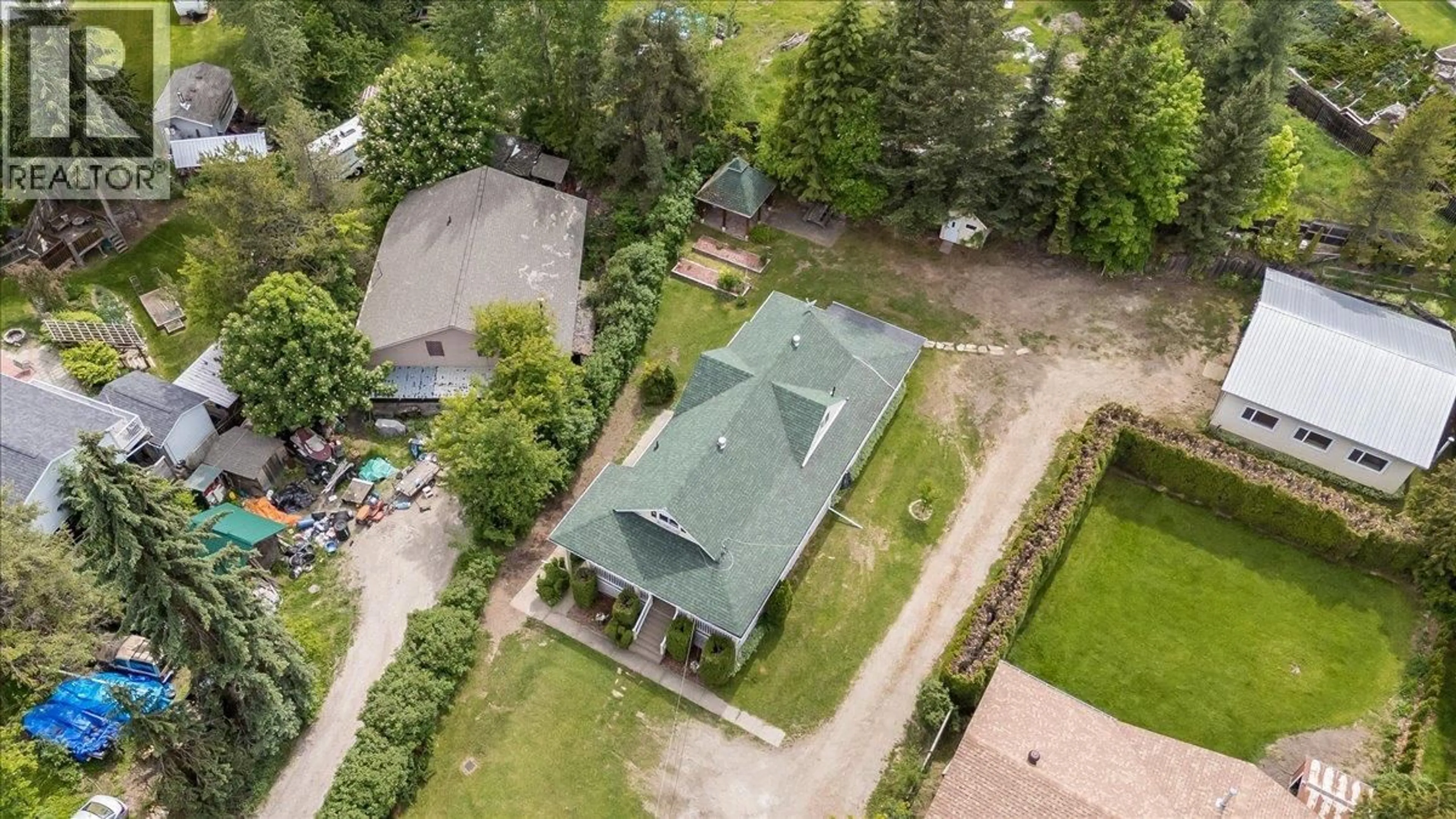 A pic from outside/outdoor area/front of a property/back of a property/a pic from drone, unknown for 25 DAVIS AVENUE, Fruitvale British Columbia V0G1L0