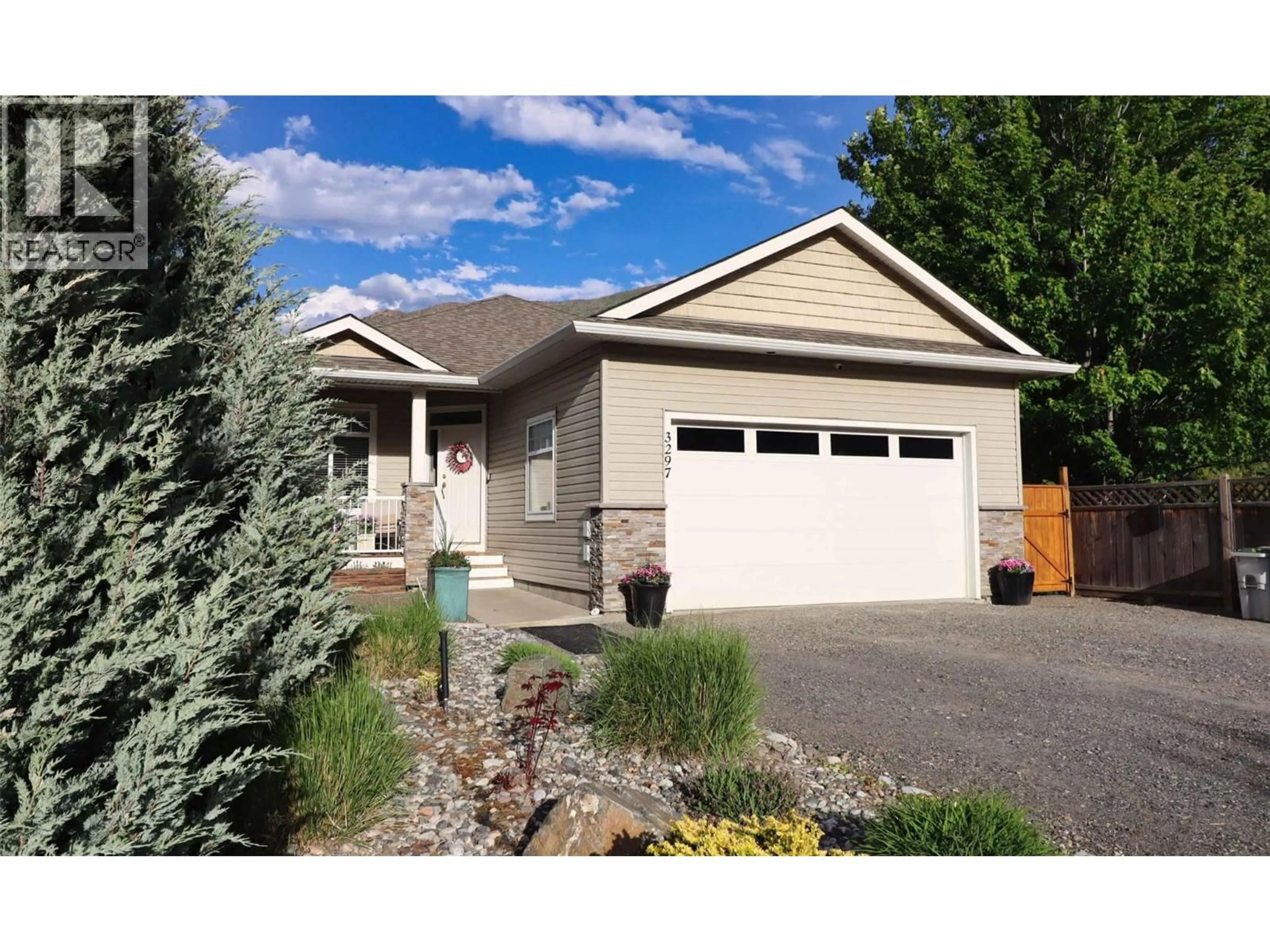 Home with vinyl exterior material, street for 3297 BANK ROAD, Kamloops British Columbia V2B6Z9