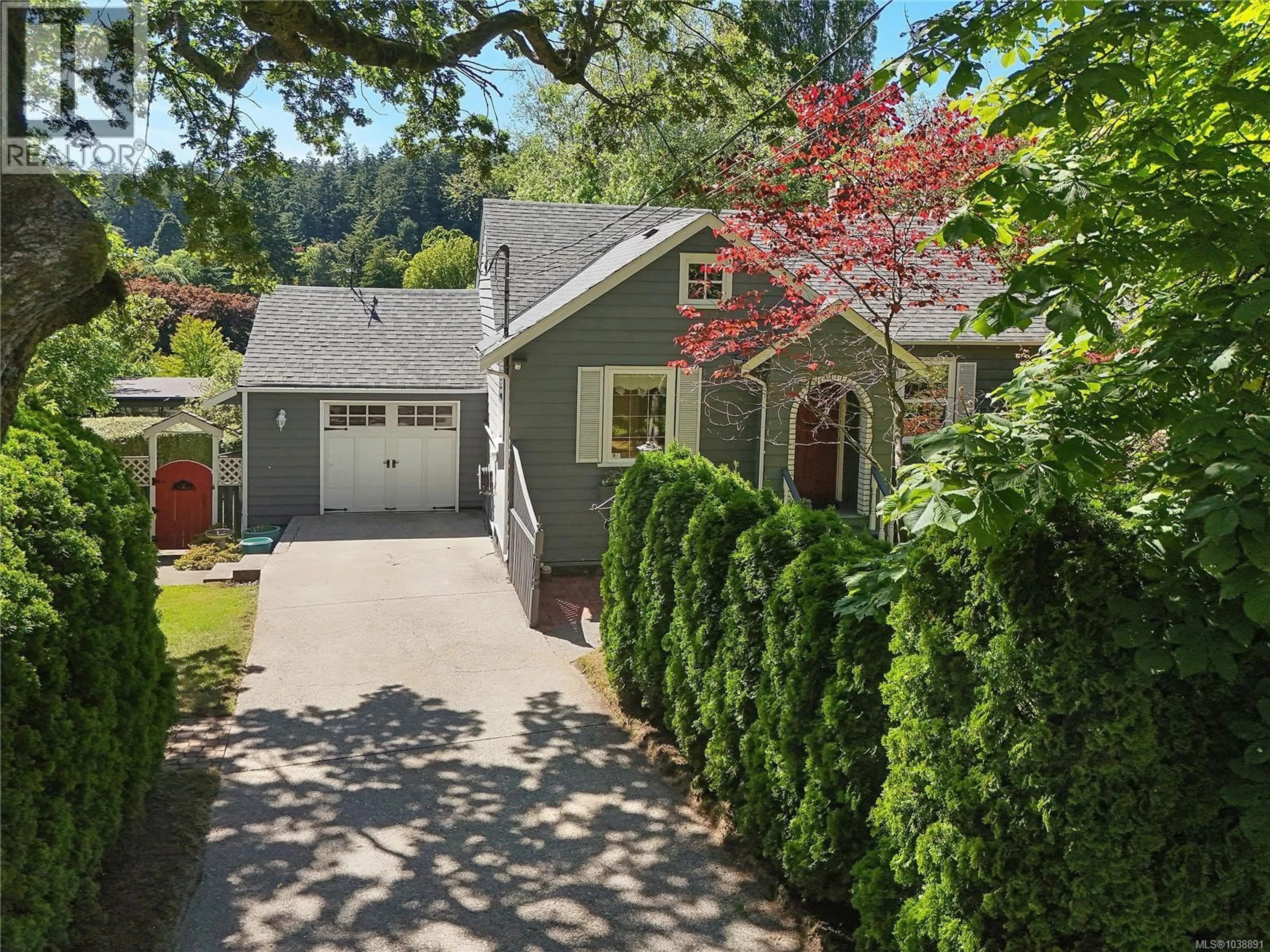 A pic from outside/outdoor area/front of a property/back of a property/a pic from drone, street for 4296 CEDAR HILL ROAD, Saanich British Columbia V8N3C5