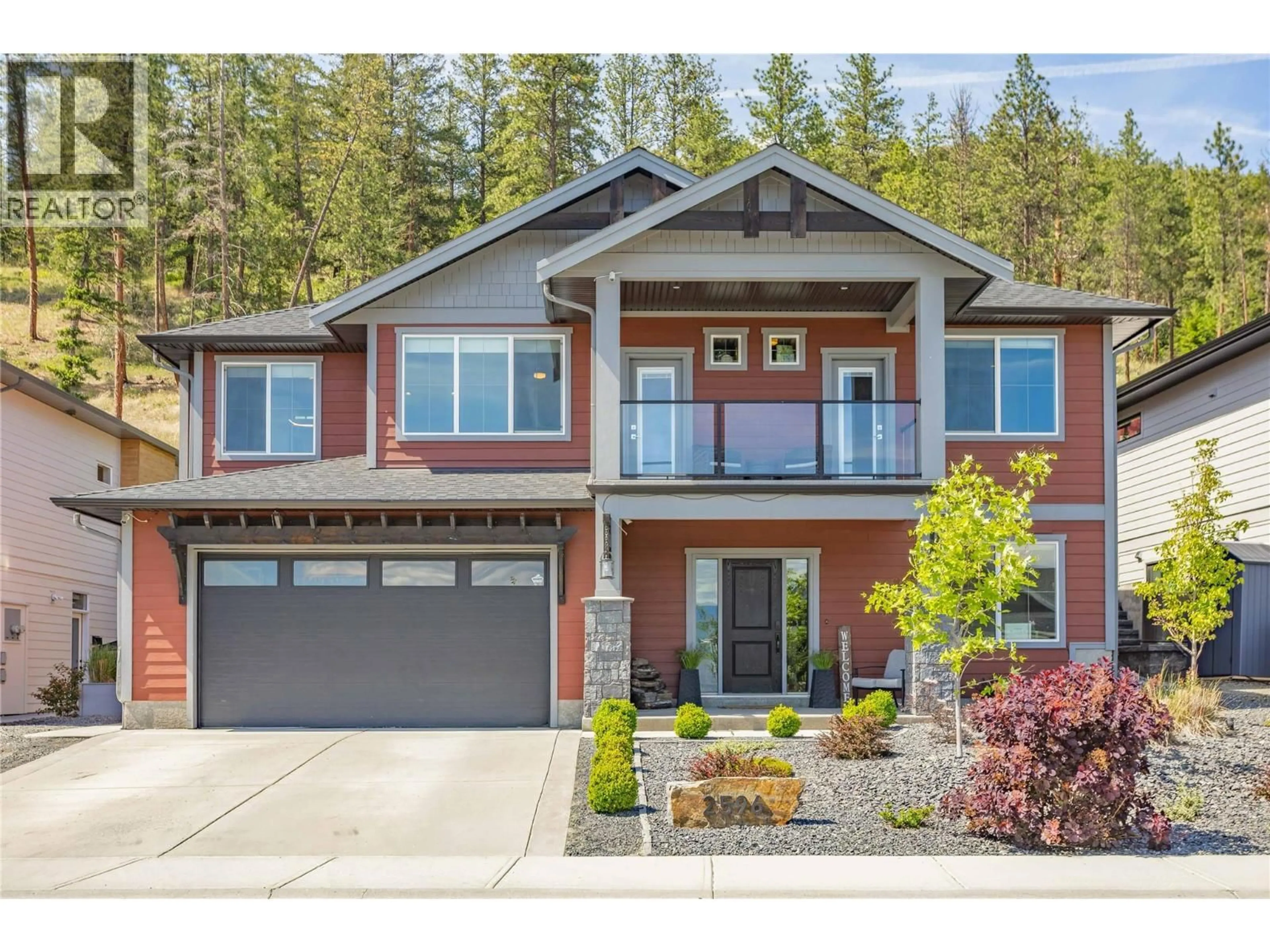 Home with brick exterior material, street for 2596 CROWN CREST DRIVE, West Kelowna British Columbia V4T1L7