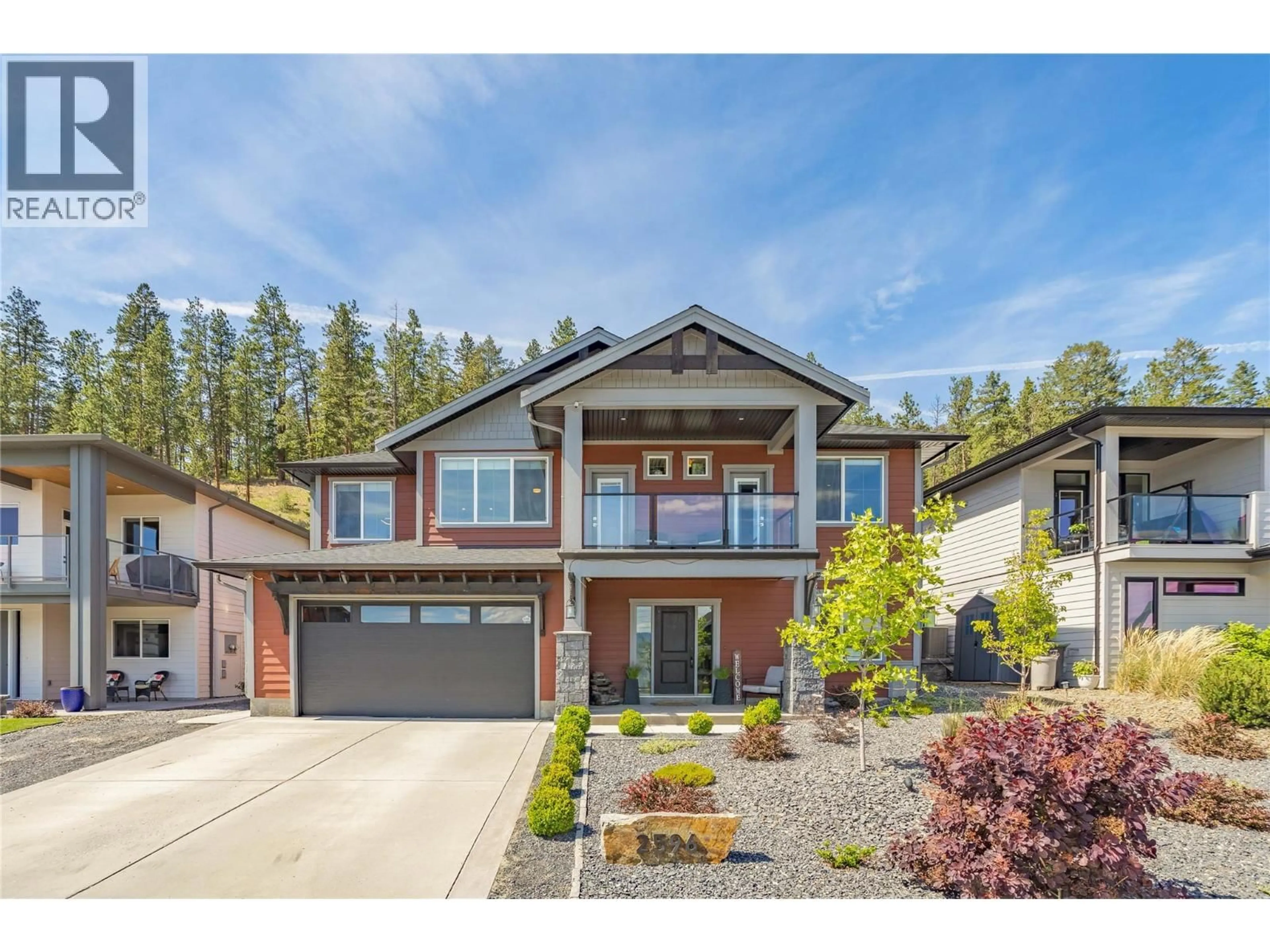 Home with brick exterior material, street for 2596 CROWN CREST DRIVE, West Kelowna British Columbia V4T1L7