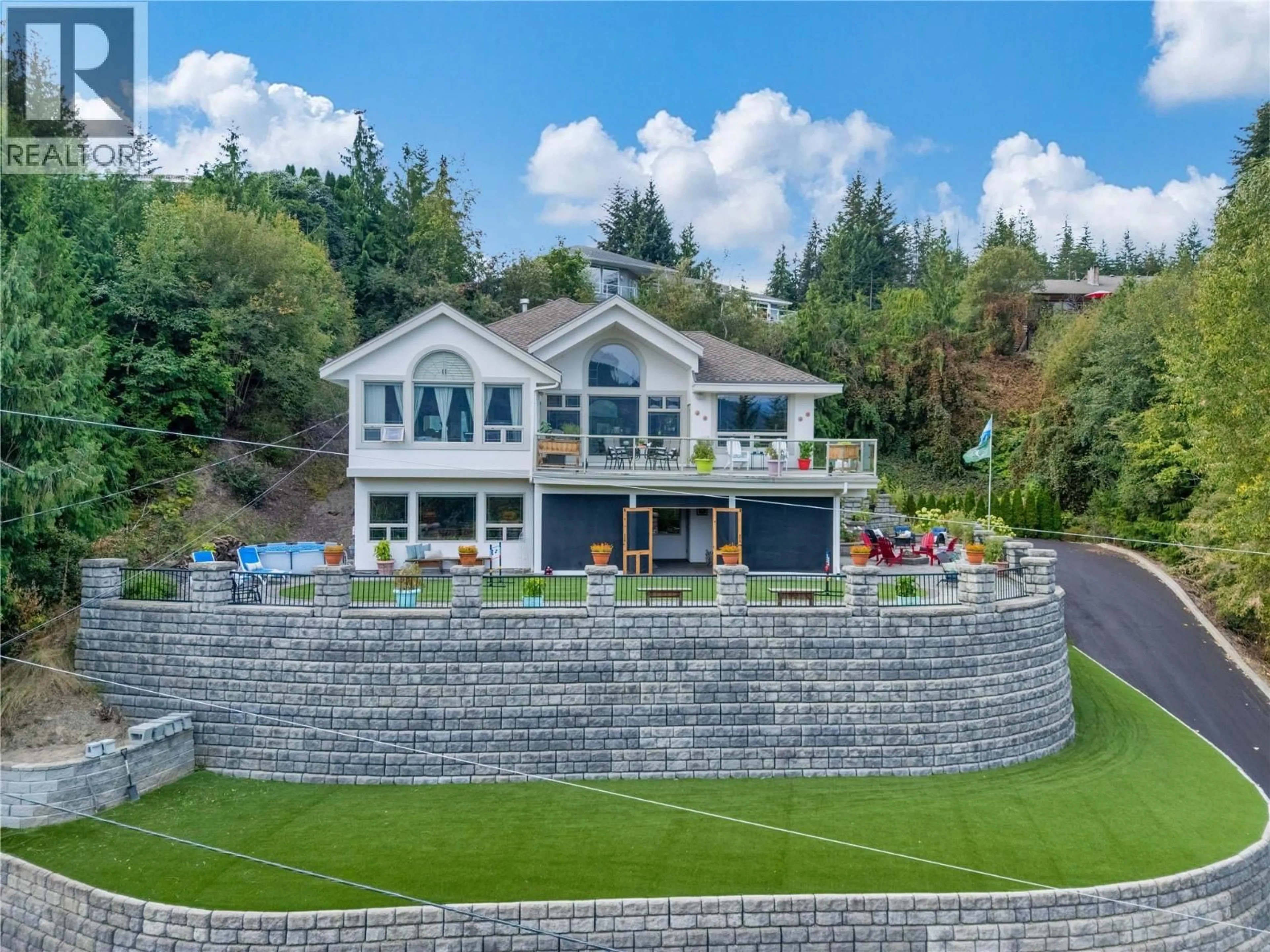 A pic from outside/outdoor area/front of a property/back of a property/a pic from drone, water/lake/river/ocean view for 2422 WAVERLY DRIVE, Blind Bay British Columbia V0E1H2