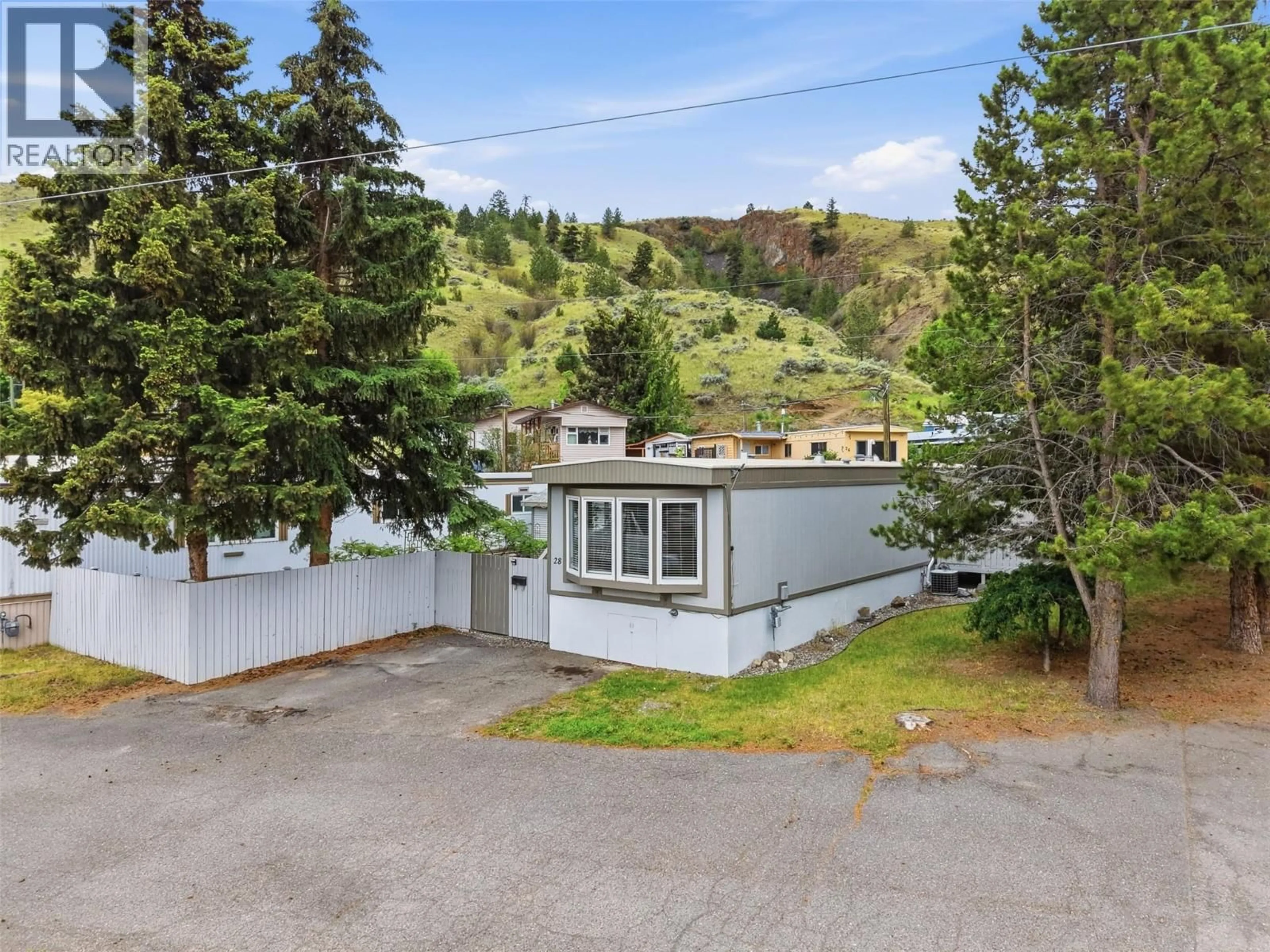 A pic from outside/outdoor area/front of a property/back of a property/a pic from drone, mountain view for 28 - 1175 ROSE HILL ROAD, Kamloops British Columbia V2E1G9