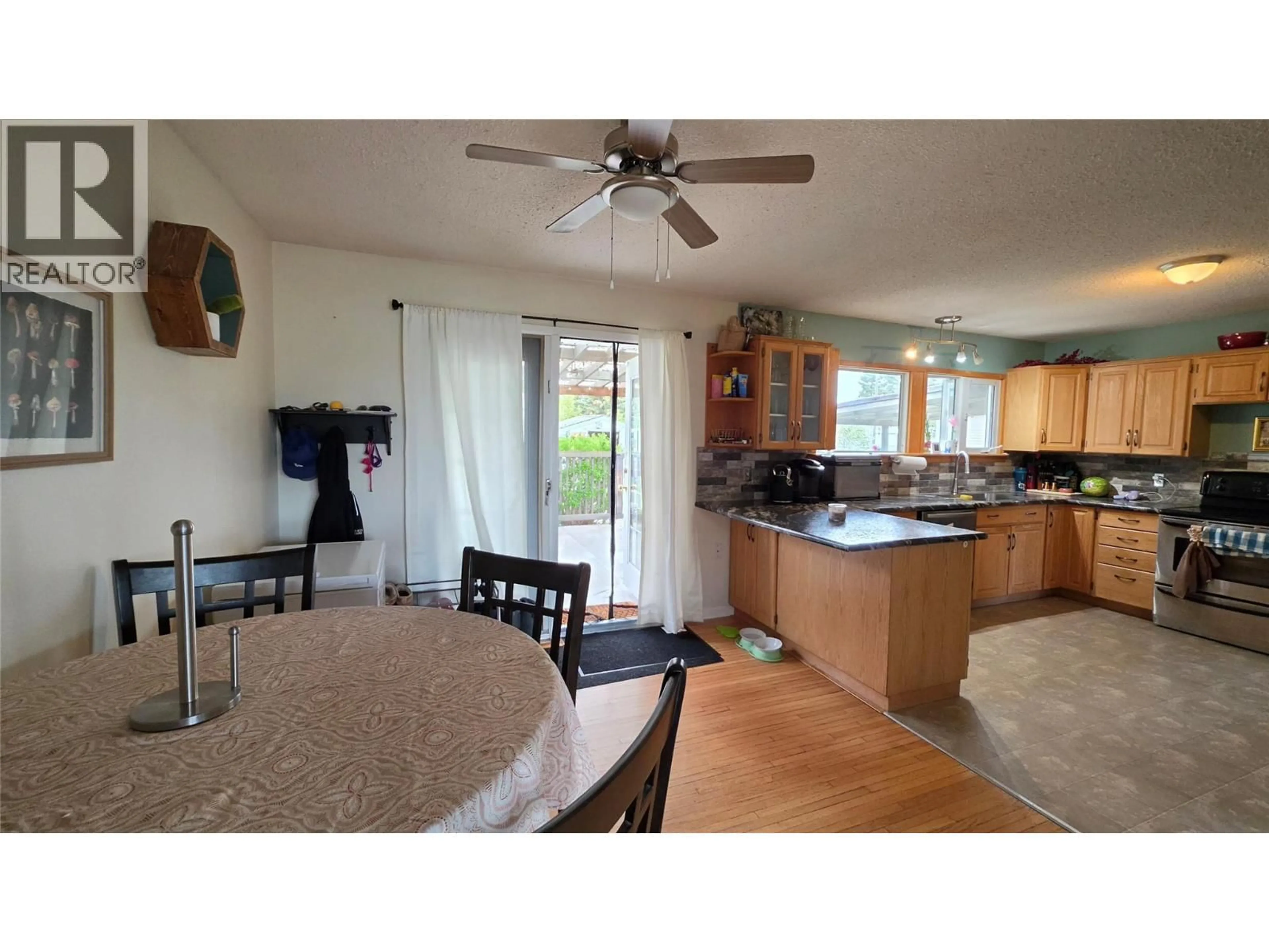 Open concept kitchen, unknown for 1316 93 AVENUE, Dawson Creek British Columbia V1G1E4