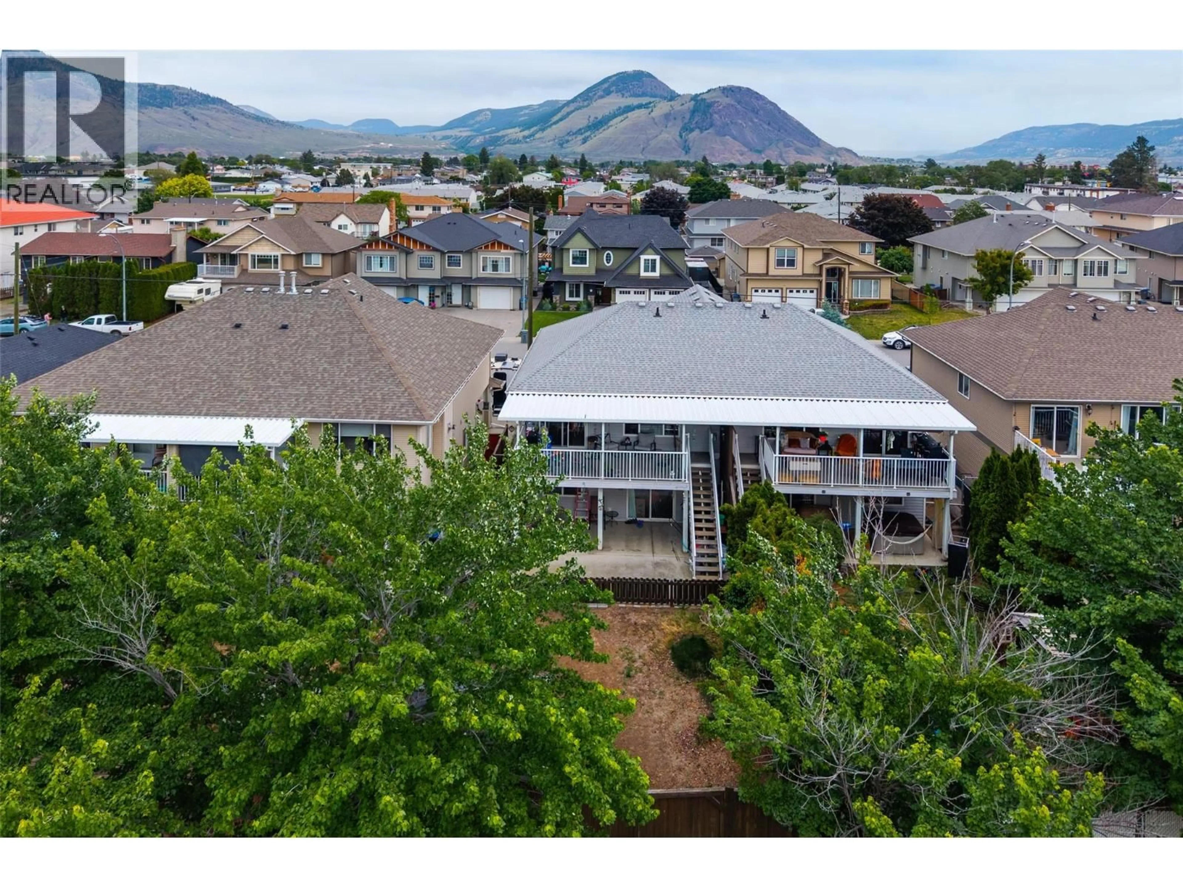 A pic from outside/outdoor area/front of a property/back of a property/a pic from drone, mountain view for 840 NICOLANI DRIVE, Kamloops British Columbia V2B5B3