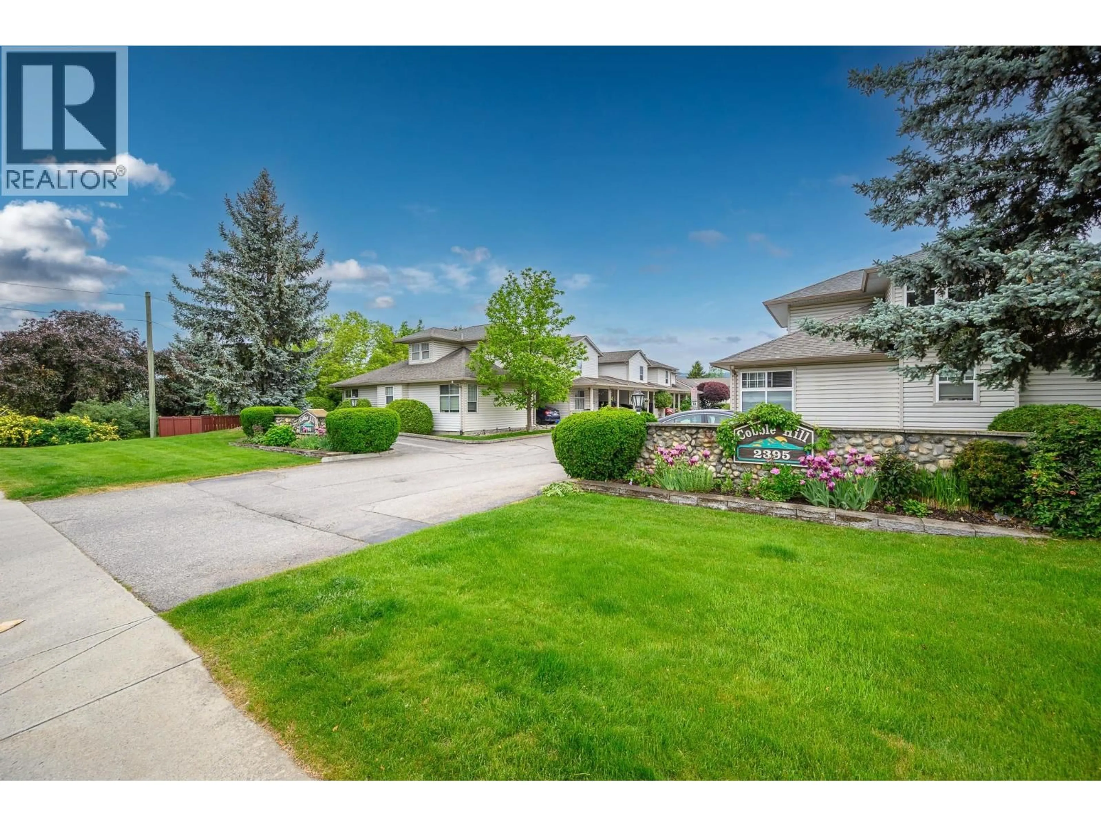 A pic from outside/outdoor area/front of a property/back of a property/a pic from drone, street for 5 - 2395 PLEASANT VALLEY ROAD, Armstrong British Columbia V0E1B2