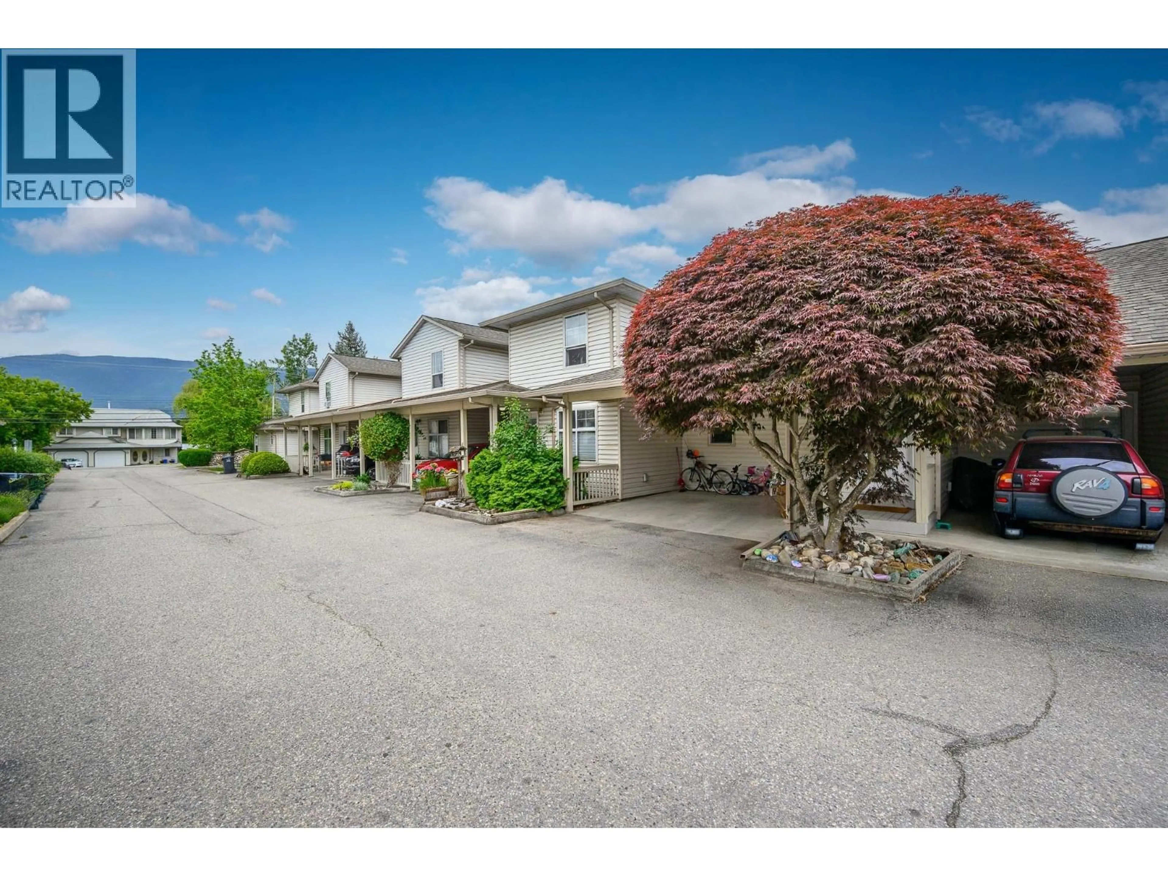 A pic from outside/outdoor area/front of a property/back of a property/a pic from drone, street for 5 - 2395 PLEASANT VALLEY ROAD, Armstrong British Columbia V0E1B2