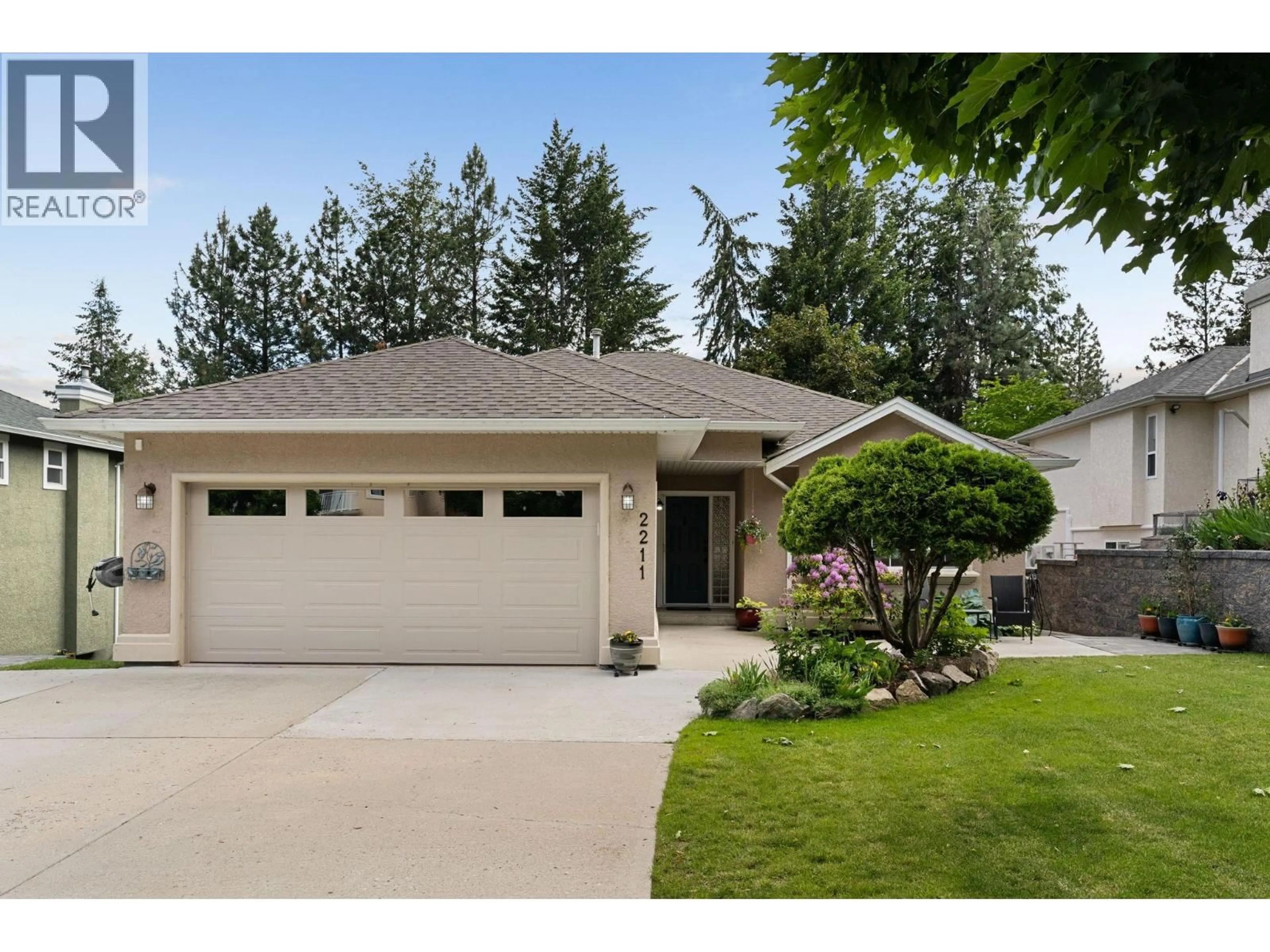 Home with vinyl exterior material, street for 2211 SHANNON WOODS PLACE, West Kelowna British Columbia V4T2L9